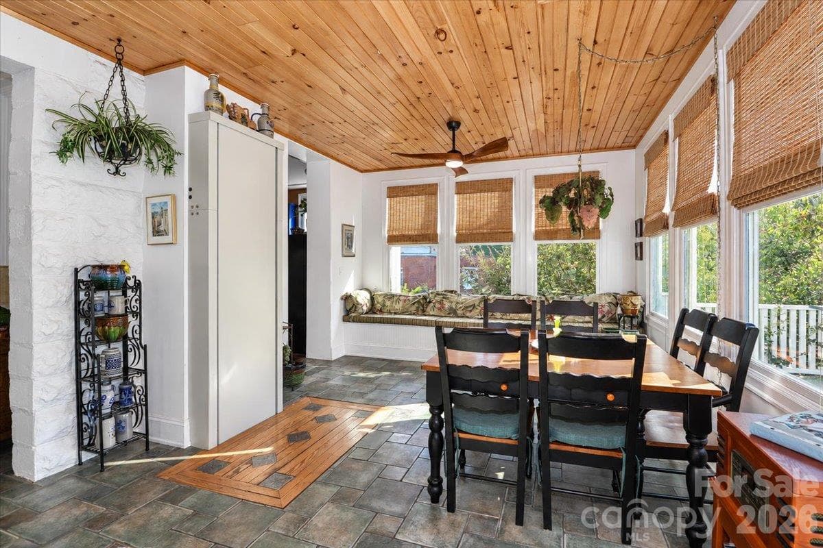 Sunroom with Elevator to Basement Garage - 403 W Front Street, Statesville