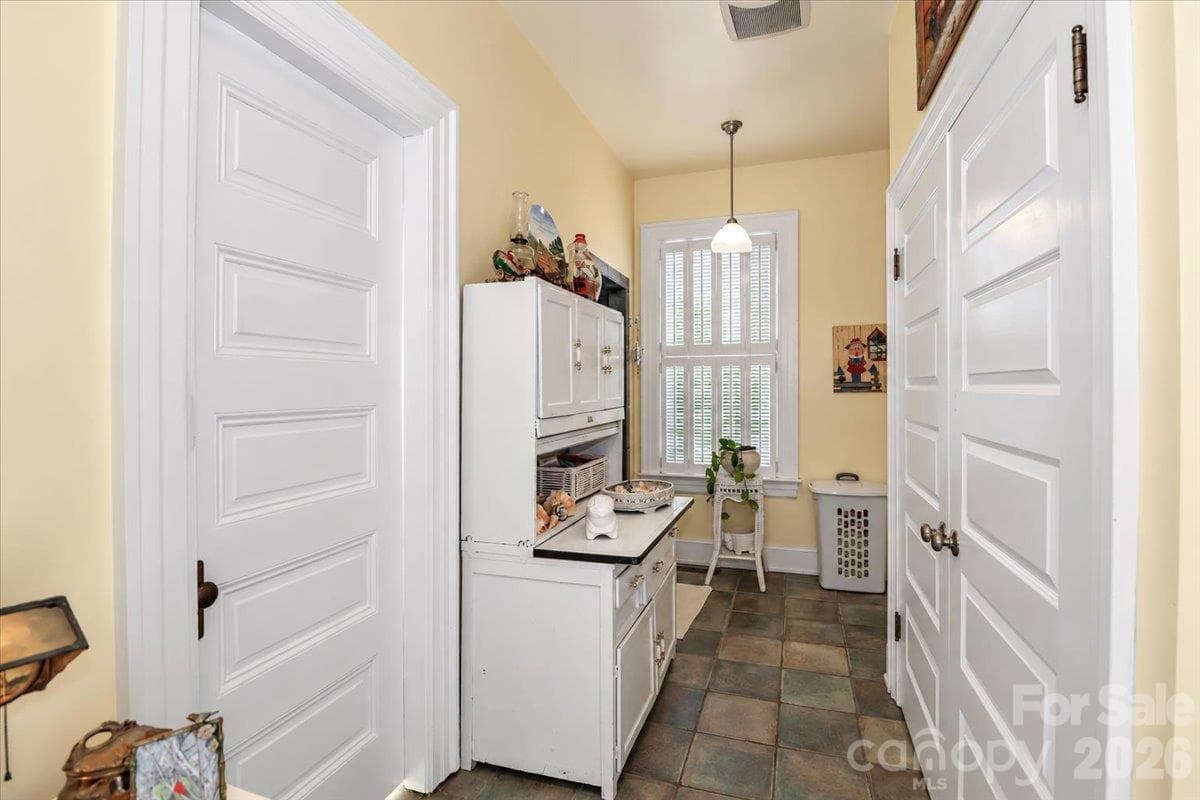 Laundry Area - Main Floor in Primary Bathroom suite. - 403 W Front Street, Statesville