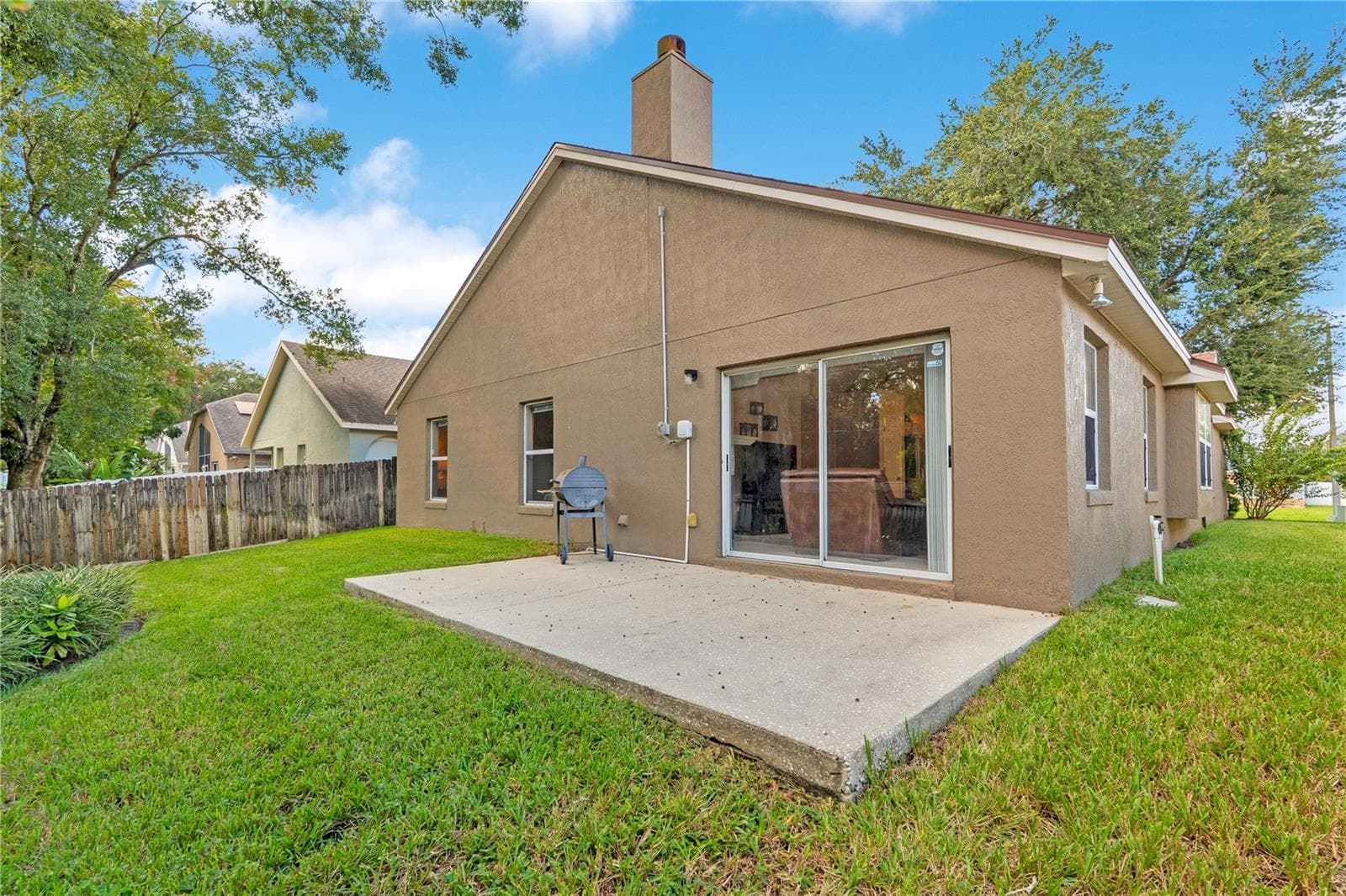 Back of Home - 1248 WOODFIELD OAKS DR, APOPKA