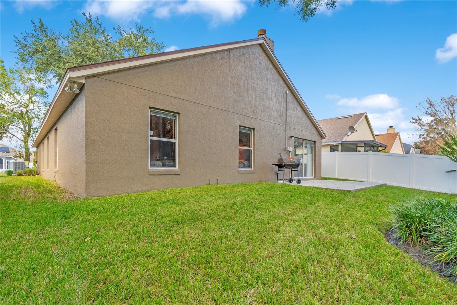 Back of Home - 1248 WOODFIELD OAKS DR, APOPKA