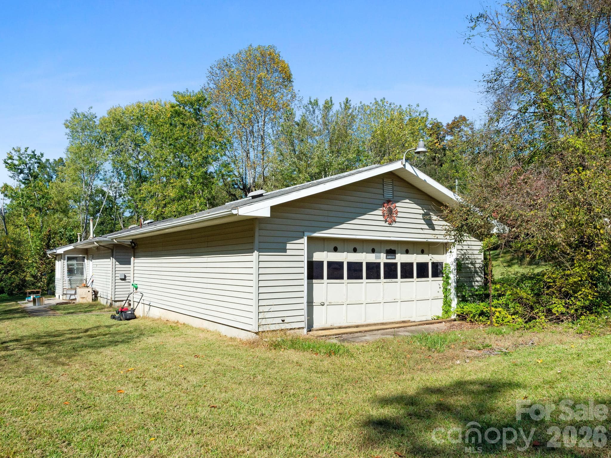 Back side of detached garage with garage door - 239 Baird Cove Road, Asheville