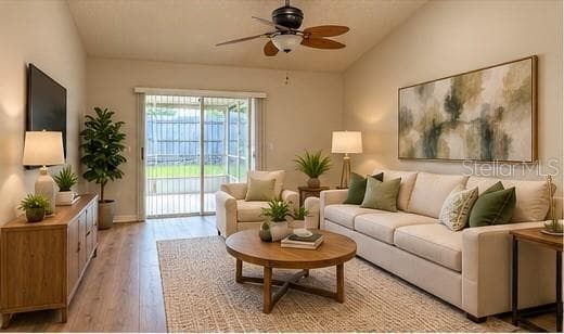 staged family room - 9765 FOX CHAPEL RD, TAMPA