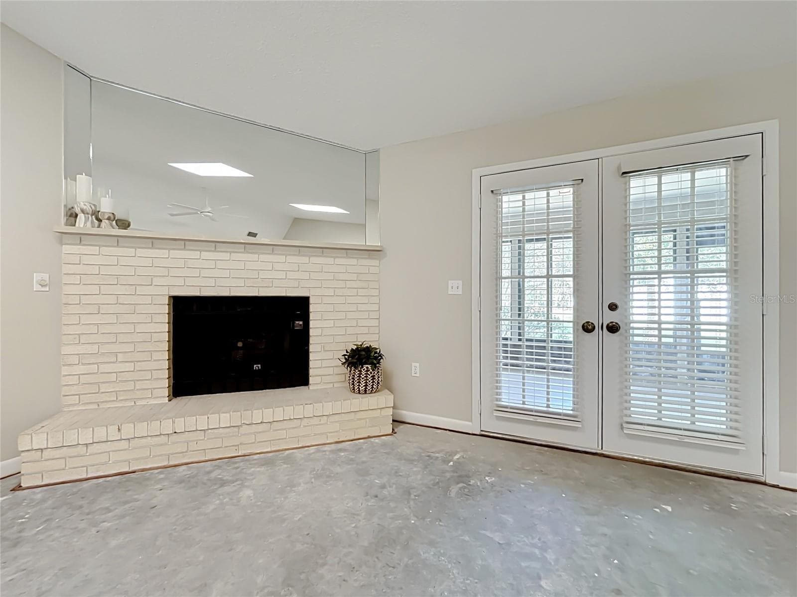 French doors open from great room to enormous Florida room - 6720 LAKELAND HIGHLANDS RD, LAKELAND