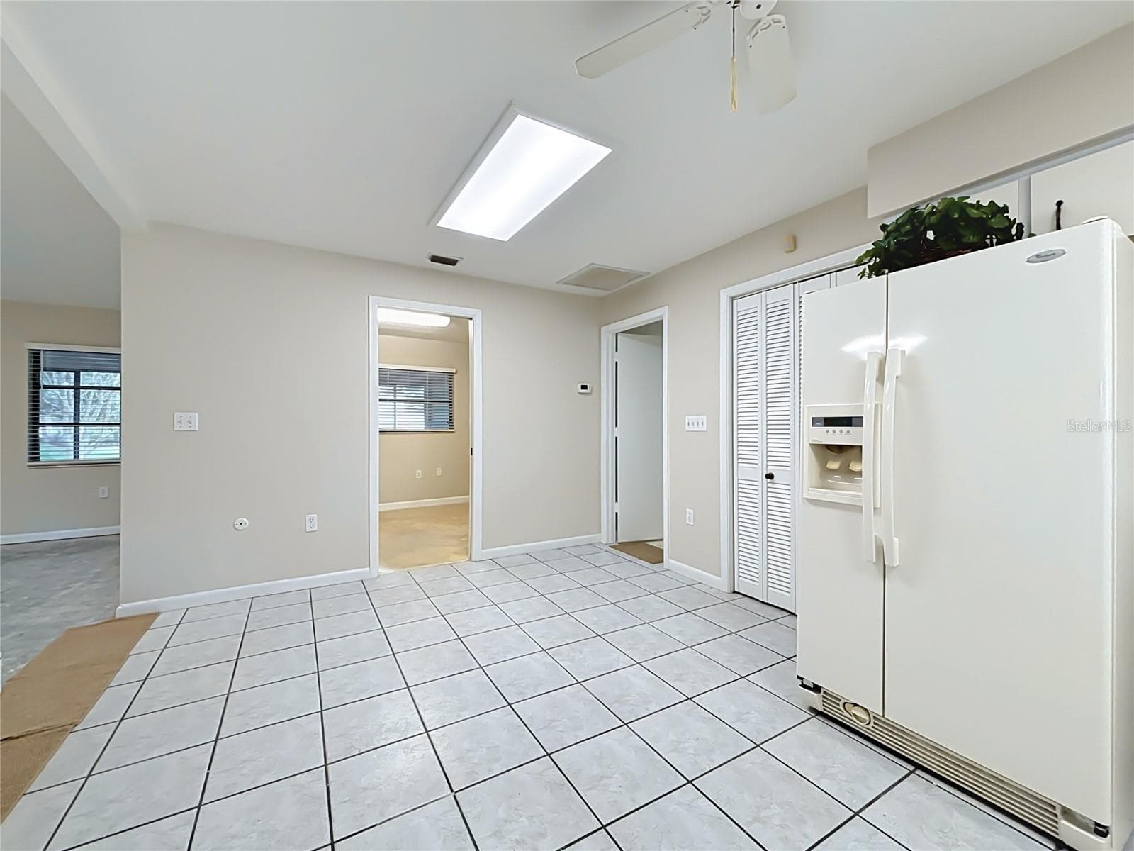 Door from kitchen opens to bonus room - 6720 LAKELAND HIGHLANDS RD, LAKELAND