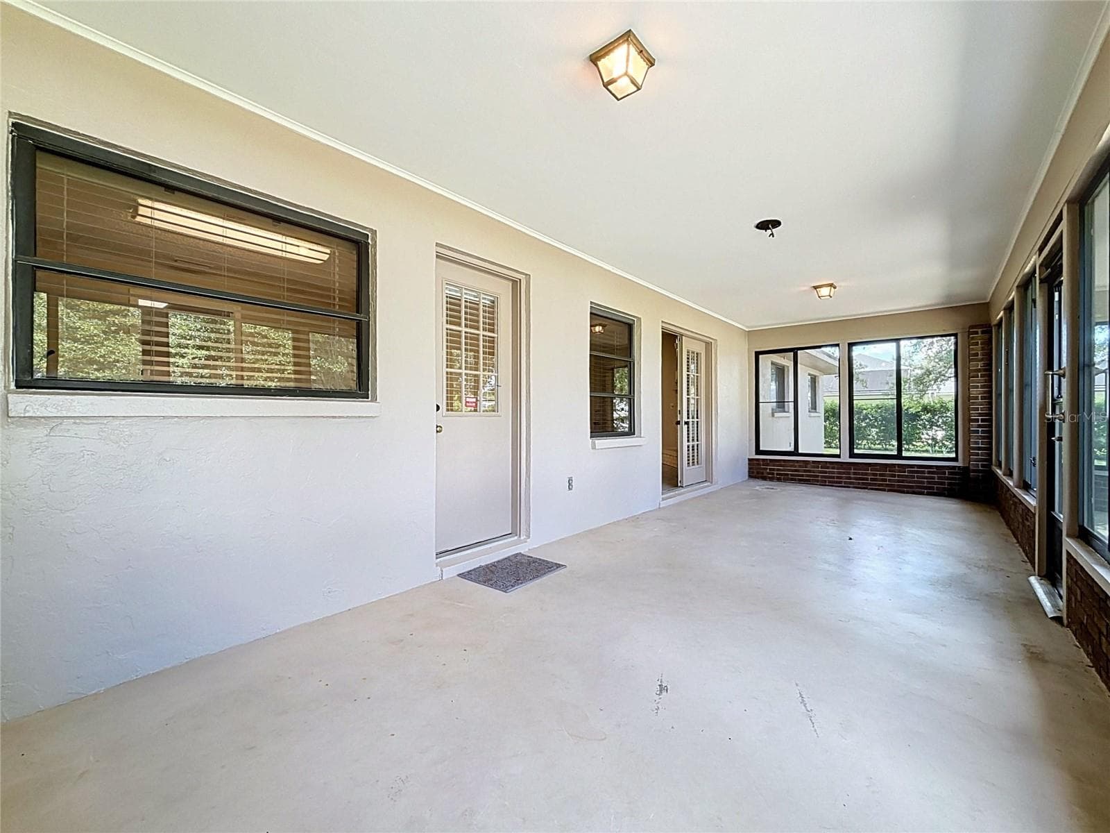 French doors open to Great Room and smaller door to bonus room - 6720 LAKELAND HIGHLANDS RD, LAKELAND
