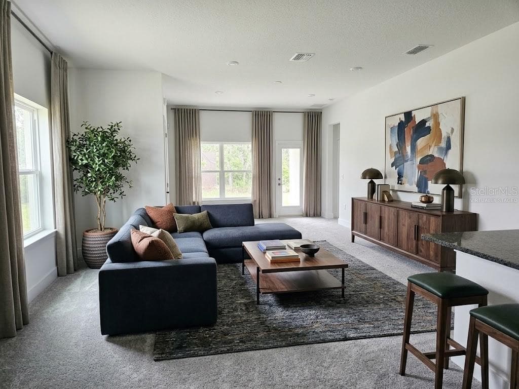 Family room - virtually staged - 7672 BENT TREE LOOP, ST CLOUD