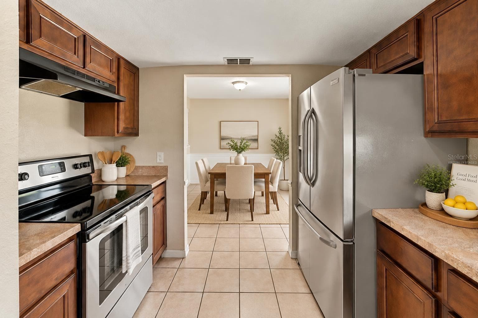 Virtually staged kitchen dining area - 7021 SHEFFIELD DR, LAKELAND