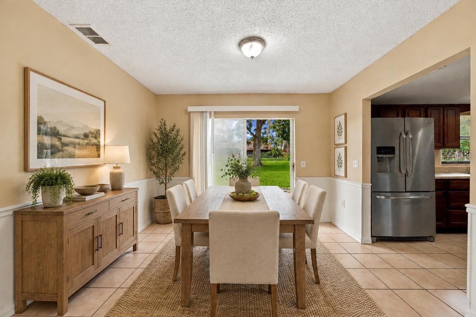 Dining area virtually staged - 7021 SHEFFIELD DR, LAKELAND