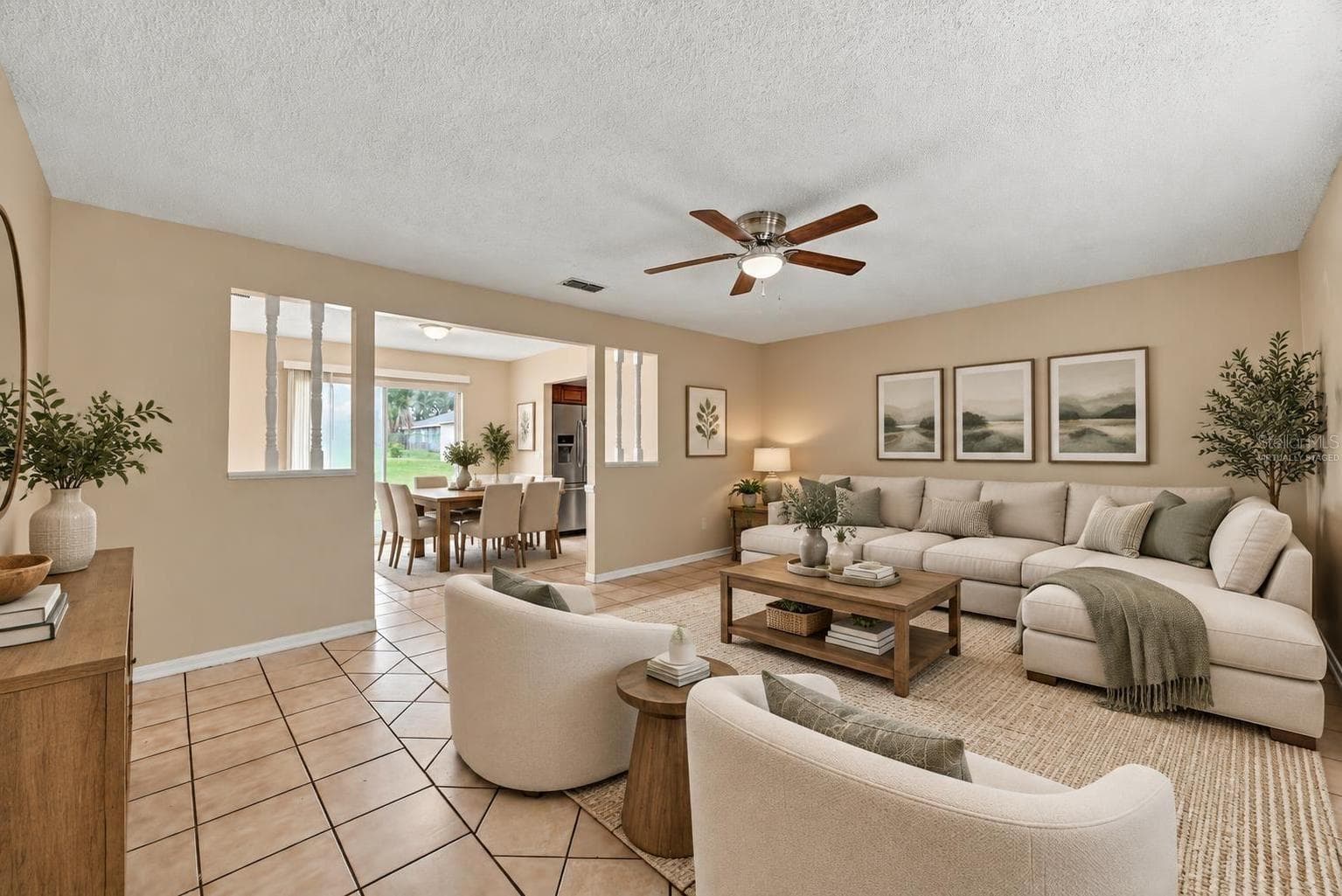 Living area virtually staged - 7021 SHEFFIELD DR, LAKELAND
