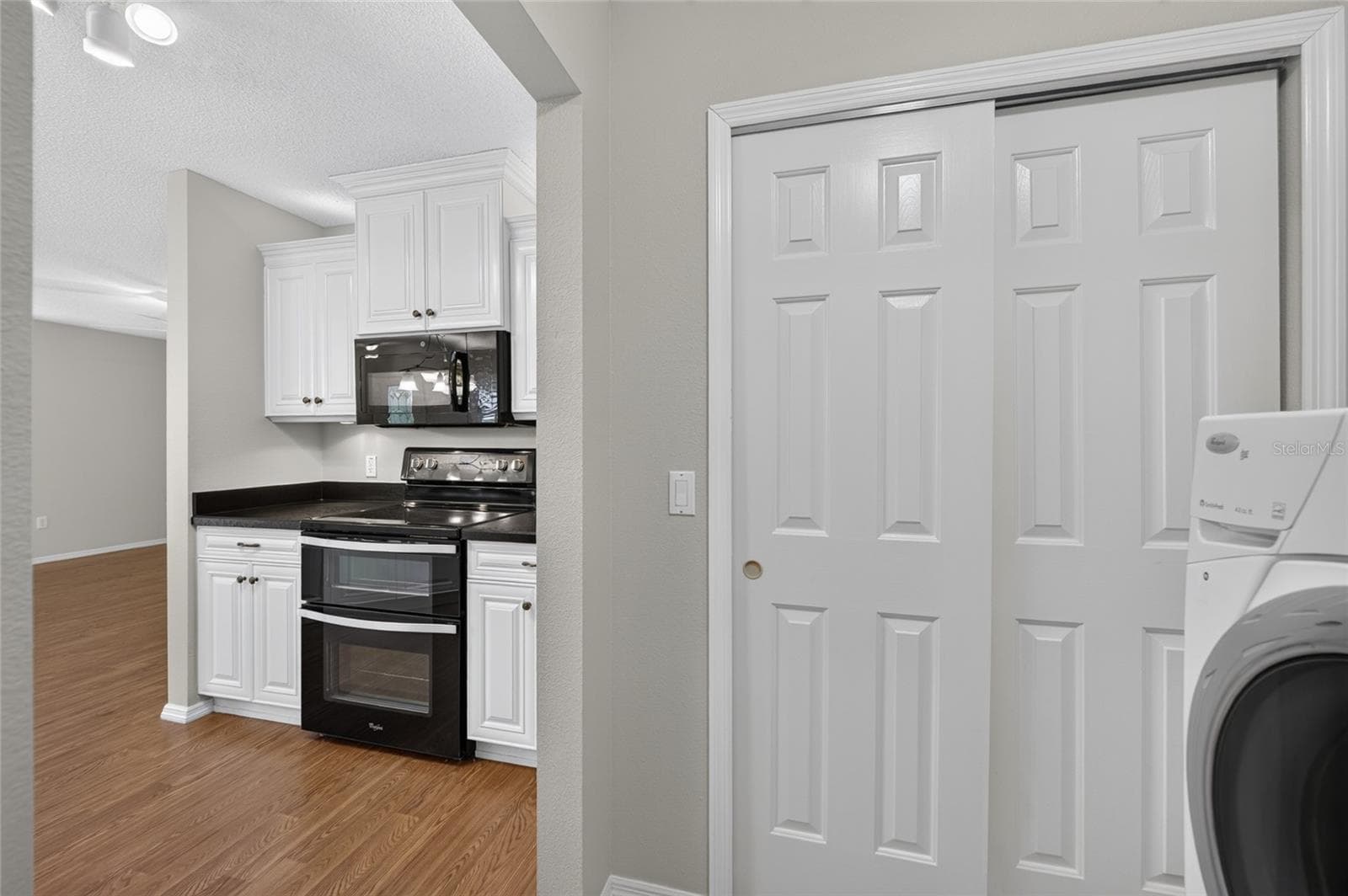 PANTRY &/or STORAGE - Double-door pantry/storage closet is conveniently located near the kitchen. - 2124 ESCOBAR AVE, THE VILLAGES