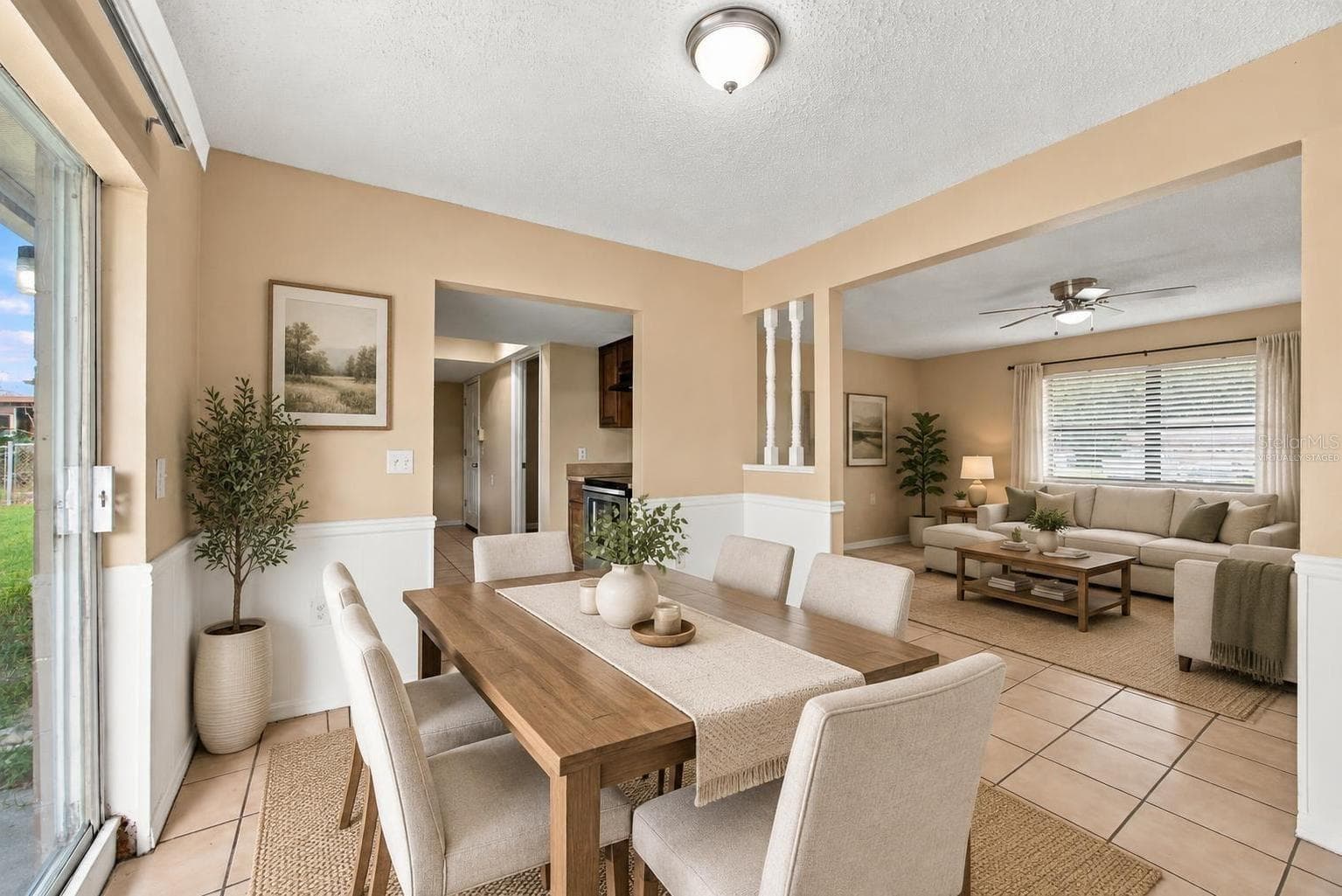 Dining area virtually staged - 7021 SHEFFIELD DR, LAKELAND