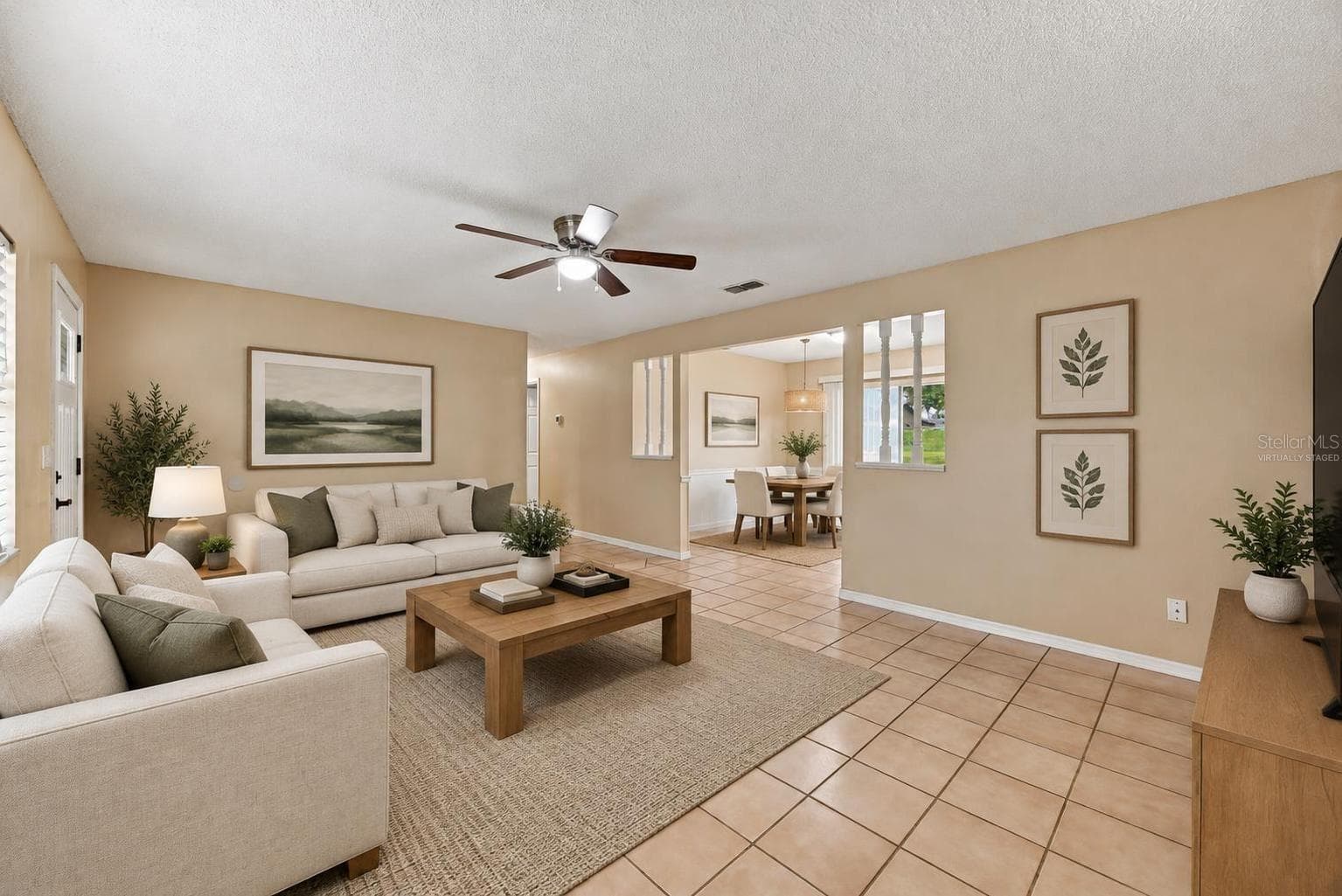 Living area virtually staged - 7021 SHEFFIELD DR, LAKELAND
