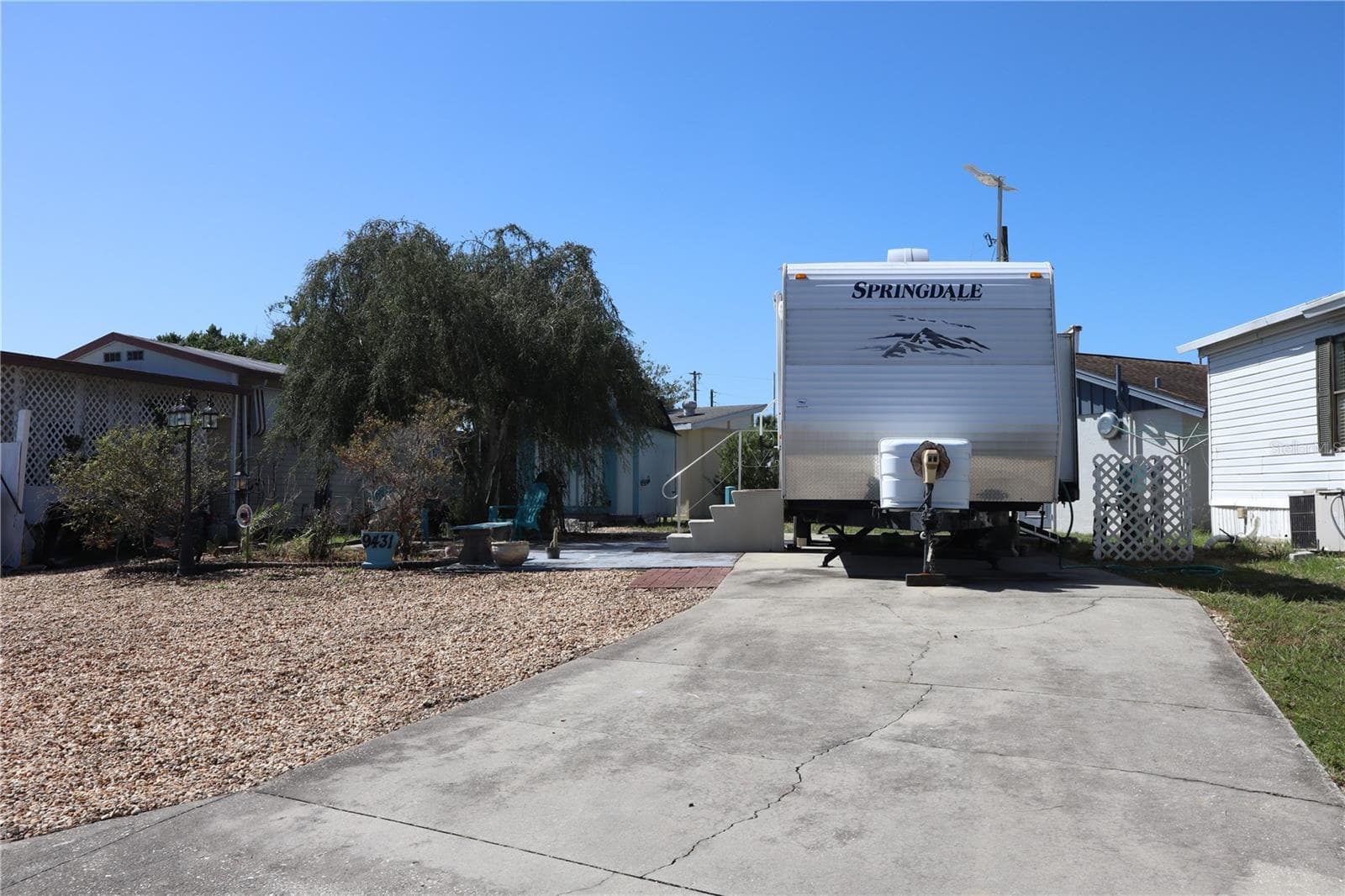 Manufactured Home at 9431 COUGAR DR, WEEKI WACHEE, photo 2 of 23