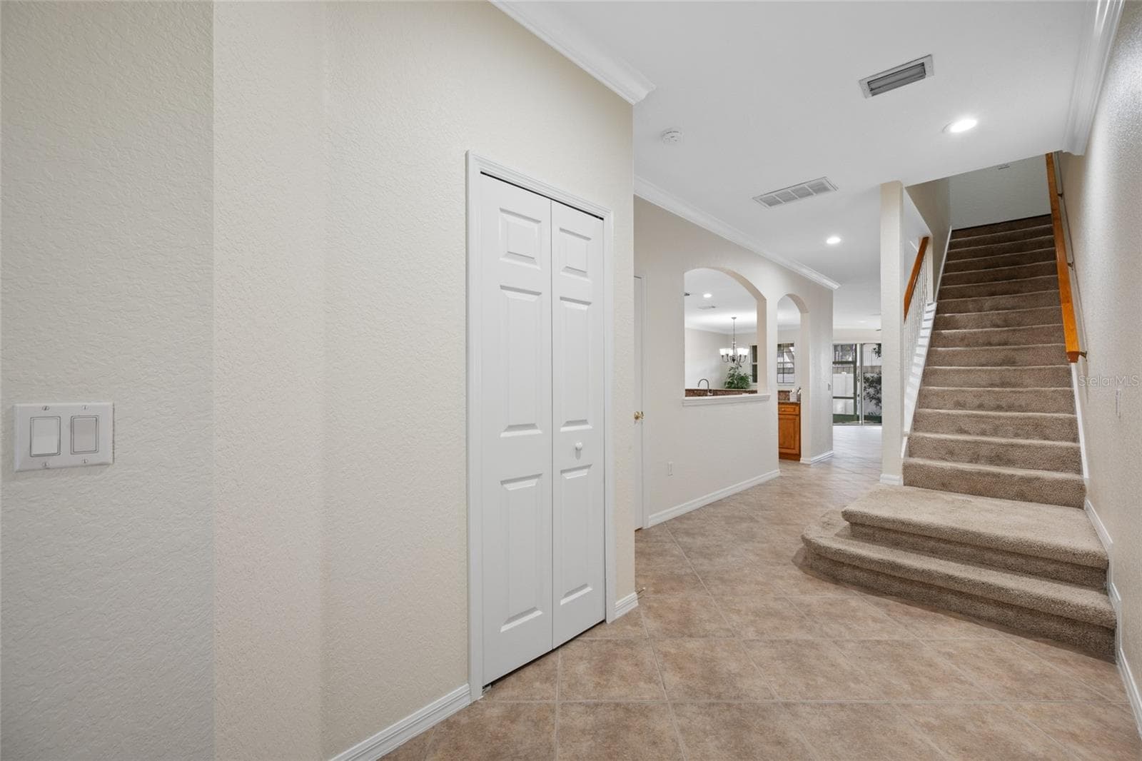 Foyer - All Tile Downstairs/Carpet on Stairs Only! - 9719 TAYLOR ROSE LN, SEMINOLE