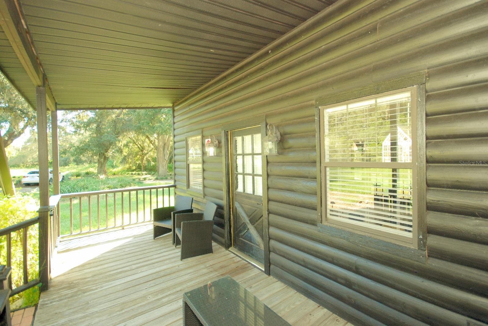 CABIN FRONT PORCH - 13022 E WHEELER RD, DOVER
