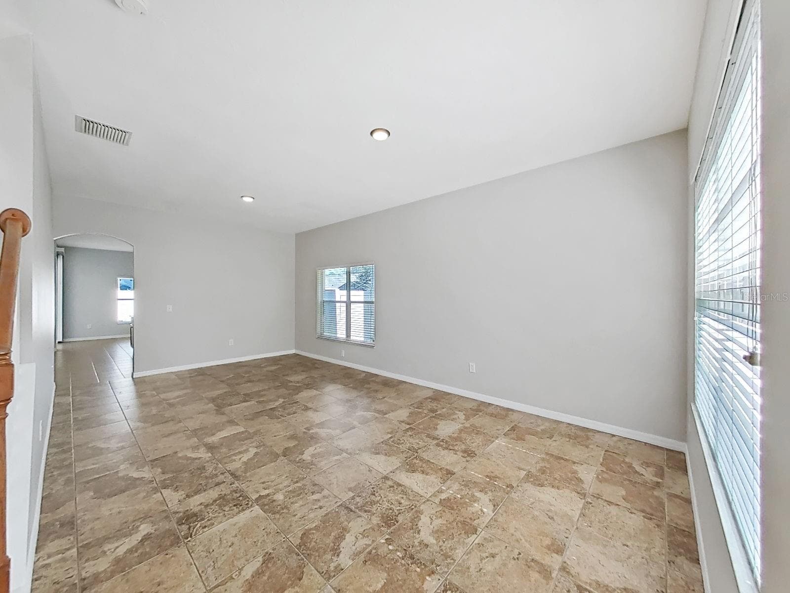 living room  and dining room - 8427 CARRIAGE POINTE DR, GIBSONTON
