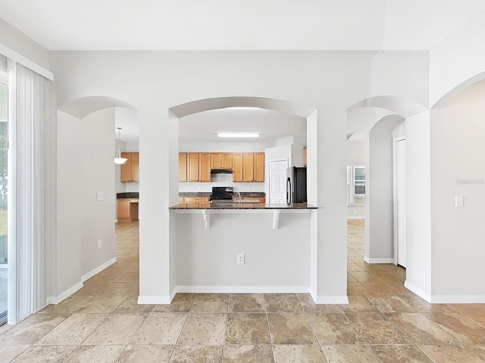 family room - 8427 CARRIAGE POINTE DR, GIBSONTON