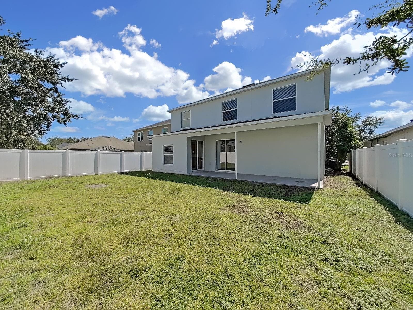 back view - 8427 CARRIAGE POINTE DR, GIBSONTON