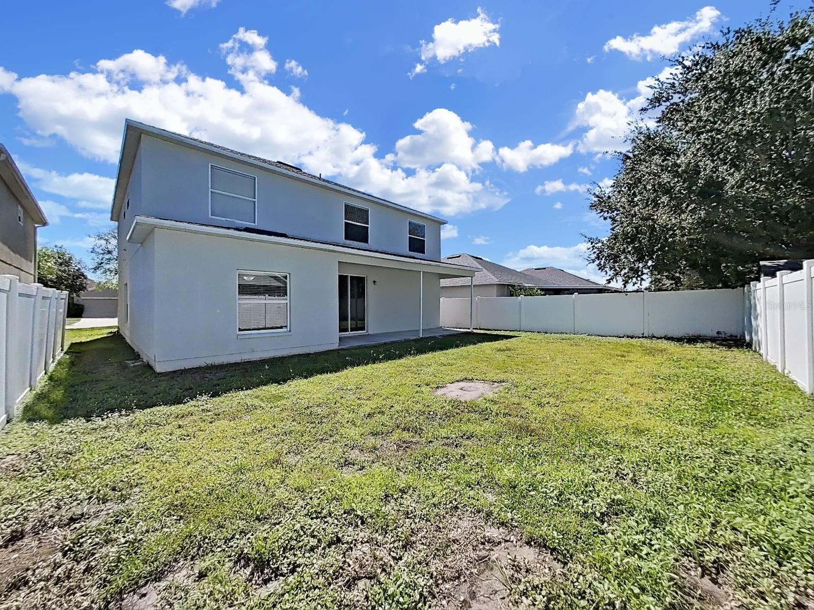 back view - 8427 CARRIAGE POINTE DR, GIBSONTON