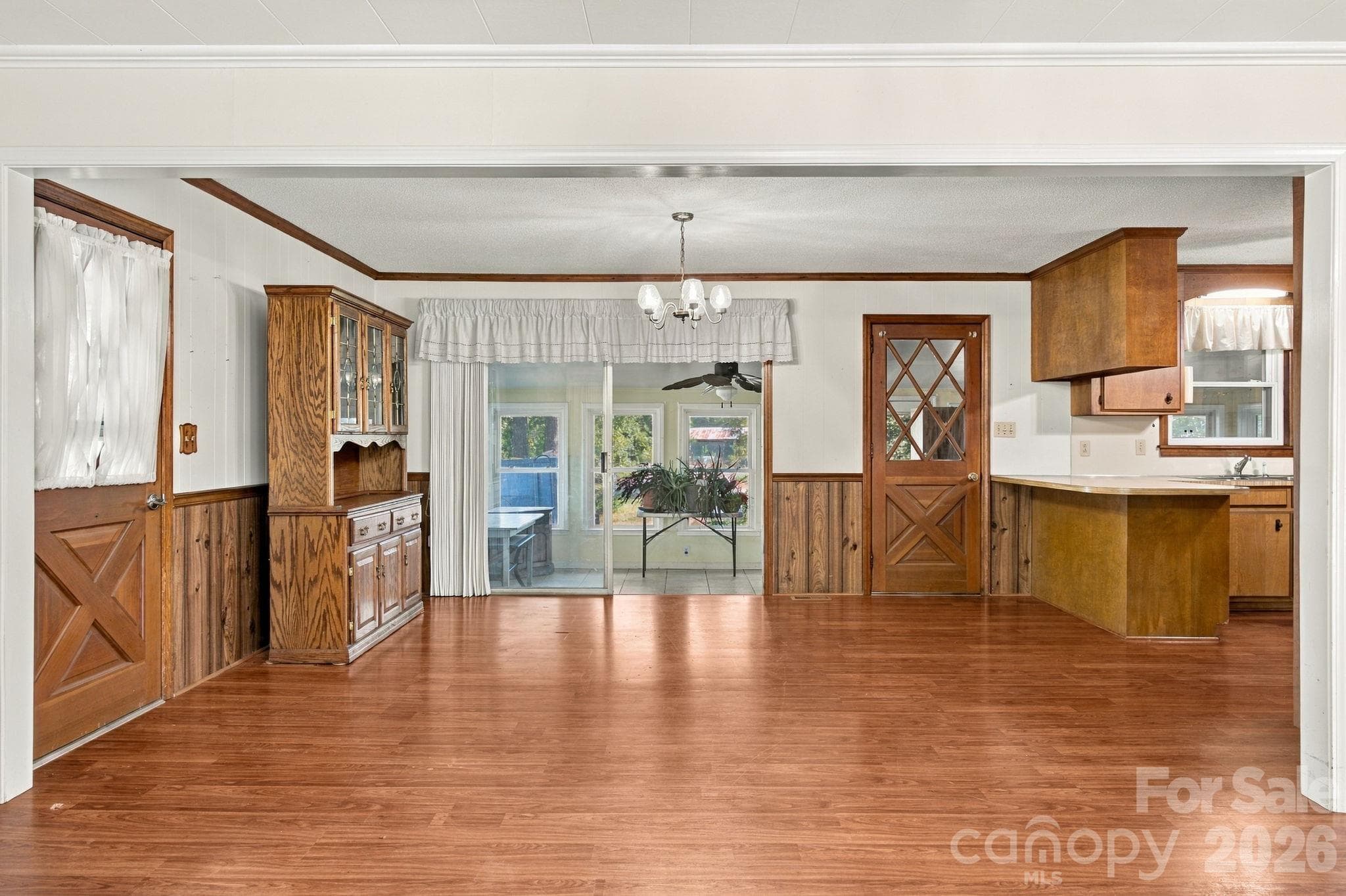 Dining room and leading out to the sunroom - 816 Central Avenue, Locust