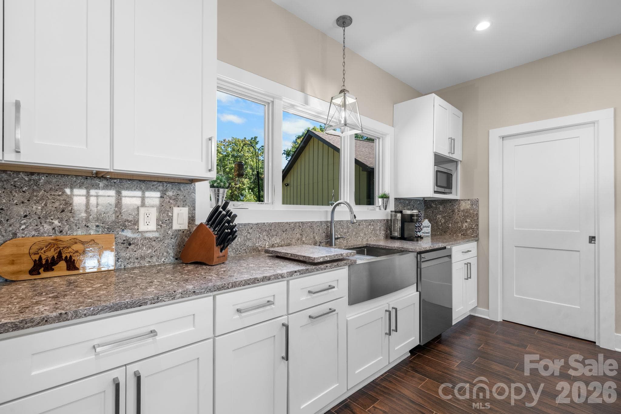 Triple window to enjoy the view from the kitchen sink - 3353 Rock Creek Road, Morganton