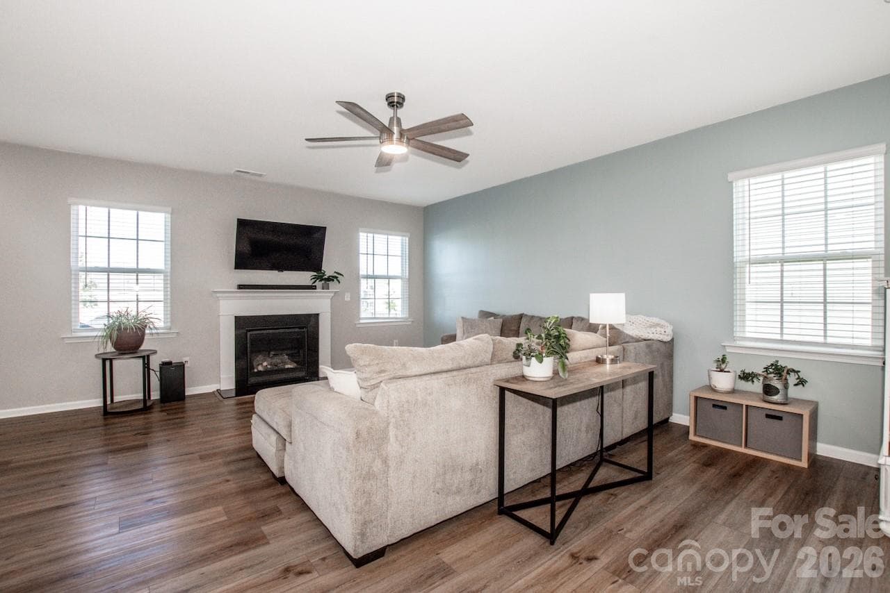 Great Room with Natural Gas Fireplace & neutral upgraded Sherwin Williams Paint - 1944 Lowland Shade Court, Maiden