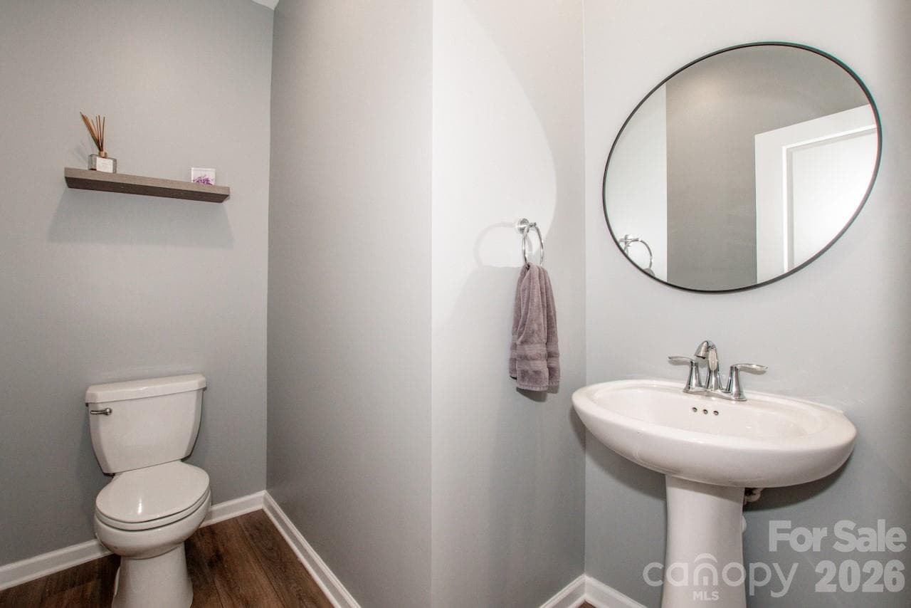 Half bath near garage - 1944 Lowland Shade Court, Maiden