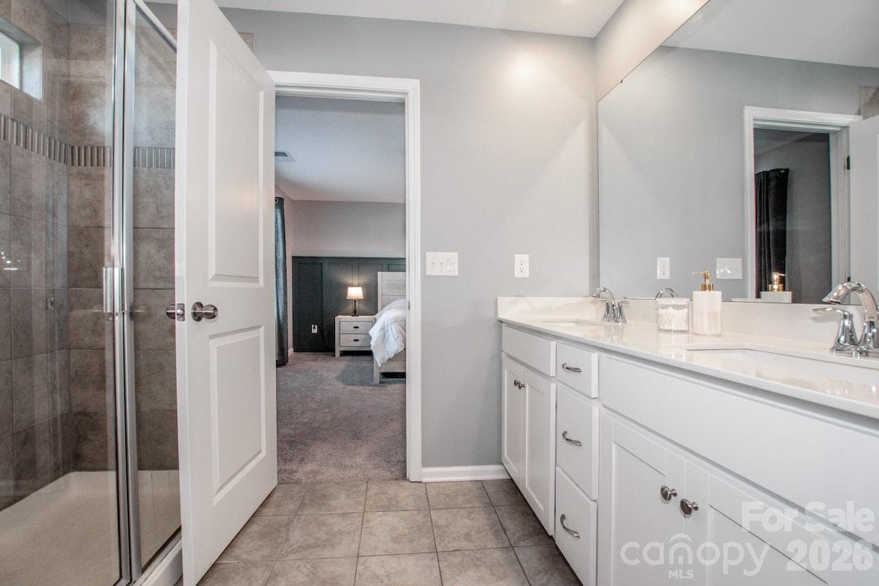 Dual Sinks and a Beautiful Tiled Shower - 1944 Lowland Shade Court, Maiden