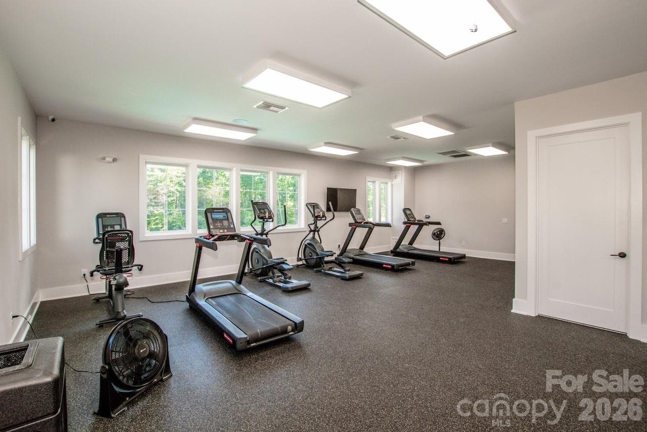 The community work out room is spacious - 1944 Lowland Shade Court, Maiden