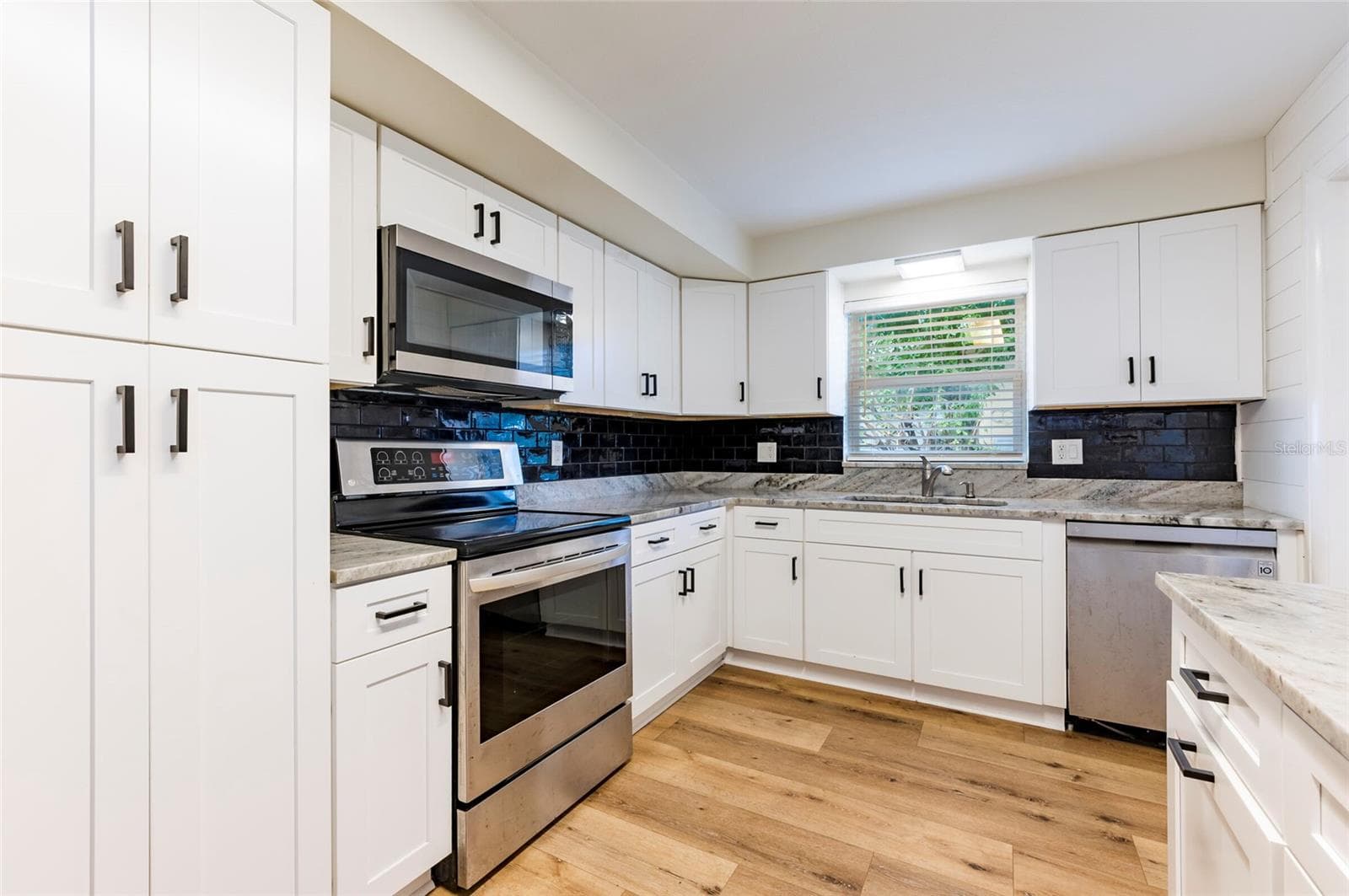 Single Family Residence at 1749 SUNSET POINT RD, CLEARWATER, photo 17 of 32