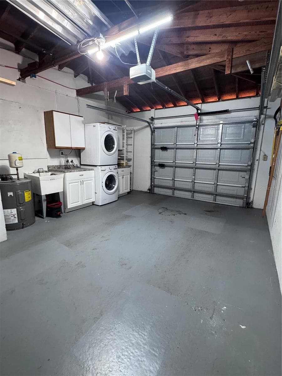 Clean one car garage with new washer and dryer which do convey. - 1709 EATON DR NE, CLEARWATER