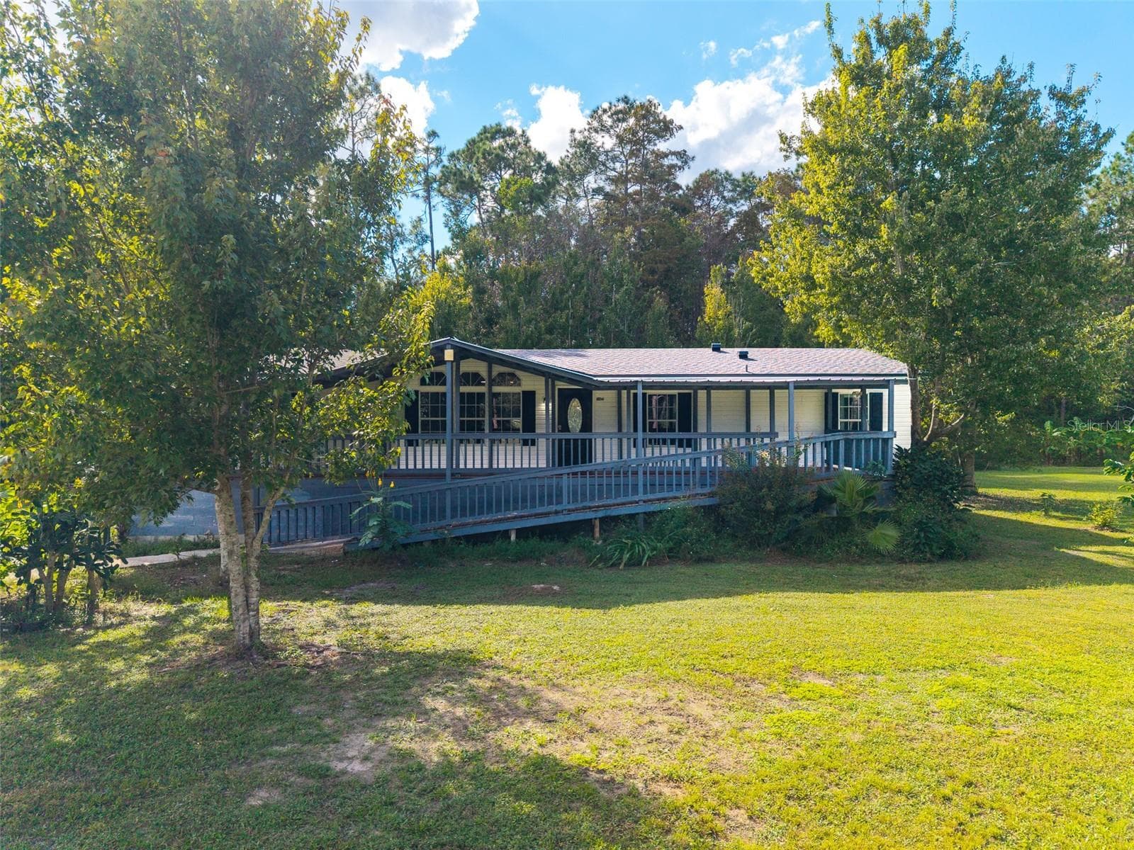 Manufactured Home at 17822 COMMONWEALTH AVE N, POLK CITY, photo 2 of 39