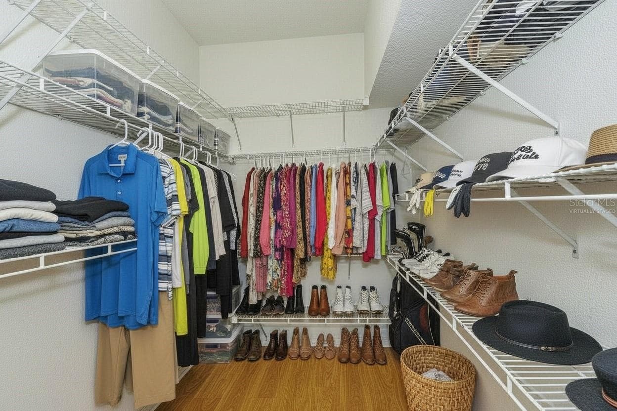 Primary Closet Virtually Staged - 5126 BLUE ASH AVE, SARASOTA