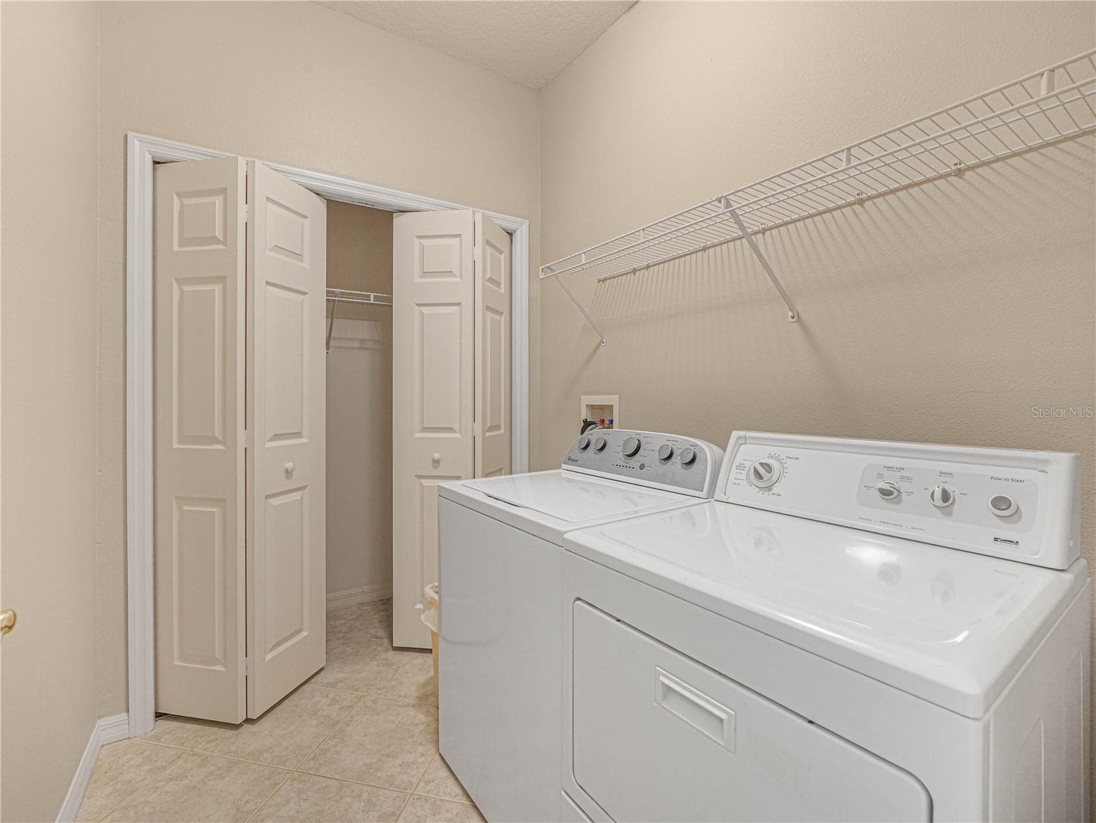 Laundry with Built in Closet - 4299 ASHTON CLUB DR, LAKE WALES