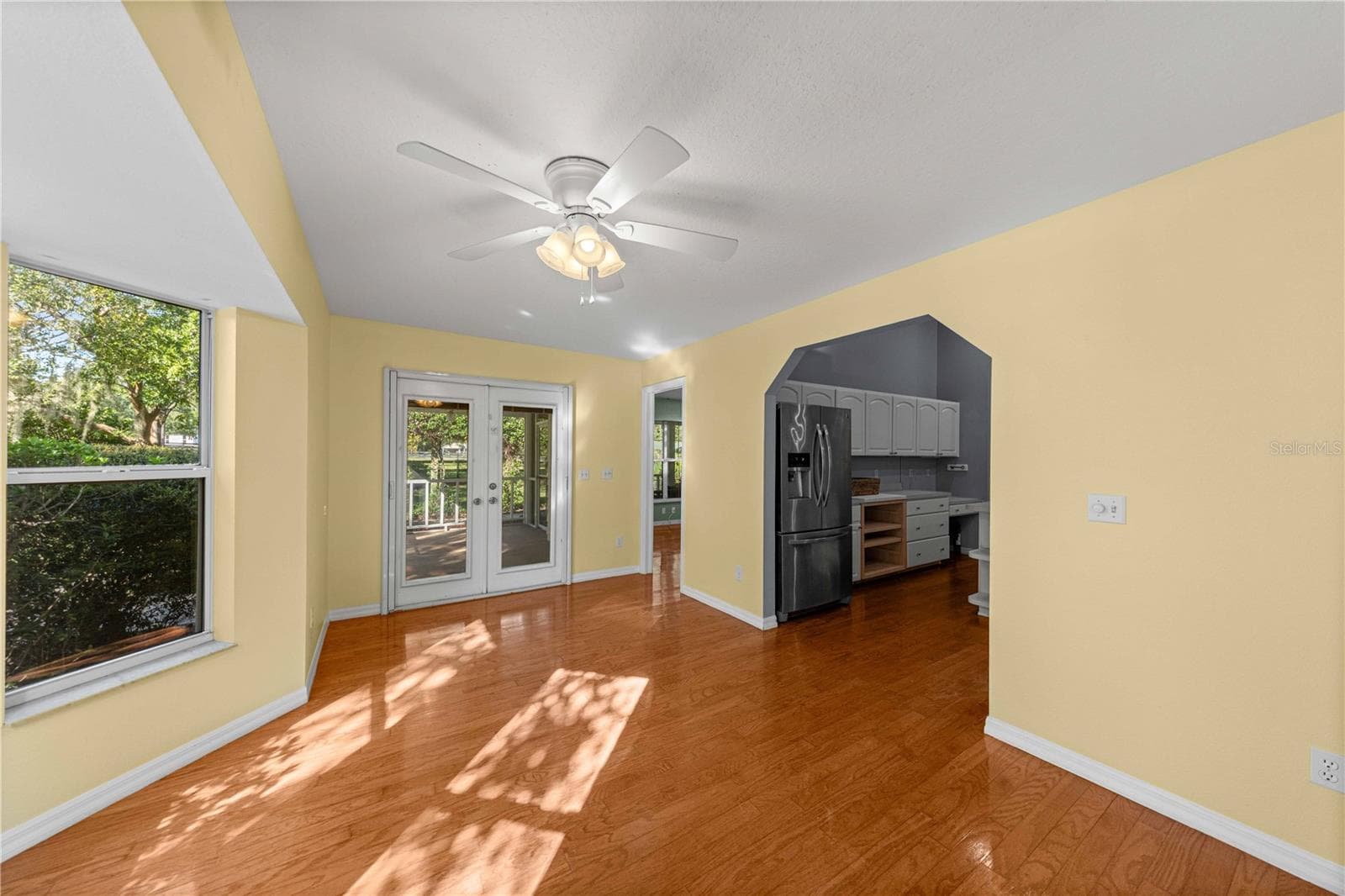 Dinning room with doors to porch - 7156 NW 11TH ST, OCALA