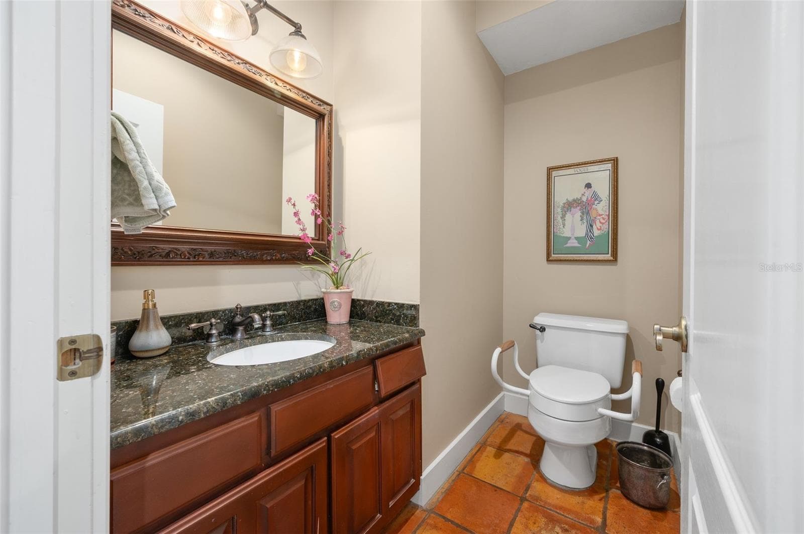 Half bath downstairs off of kitchen - 8121 SW 45TH LN, GAINESVILLE