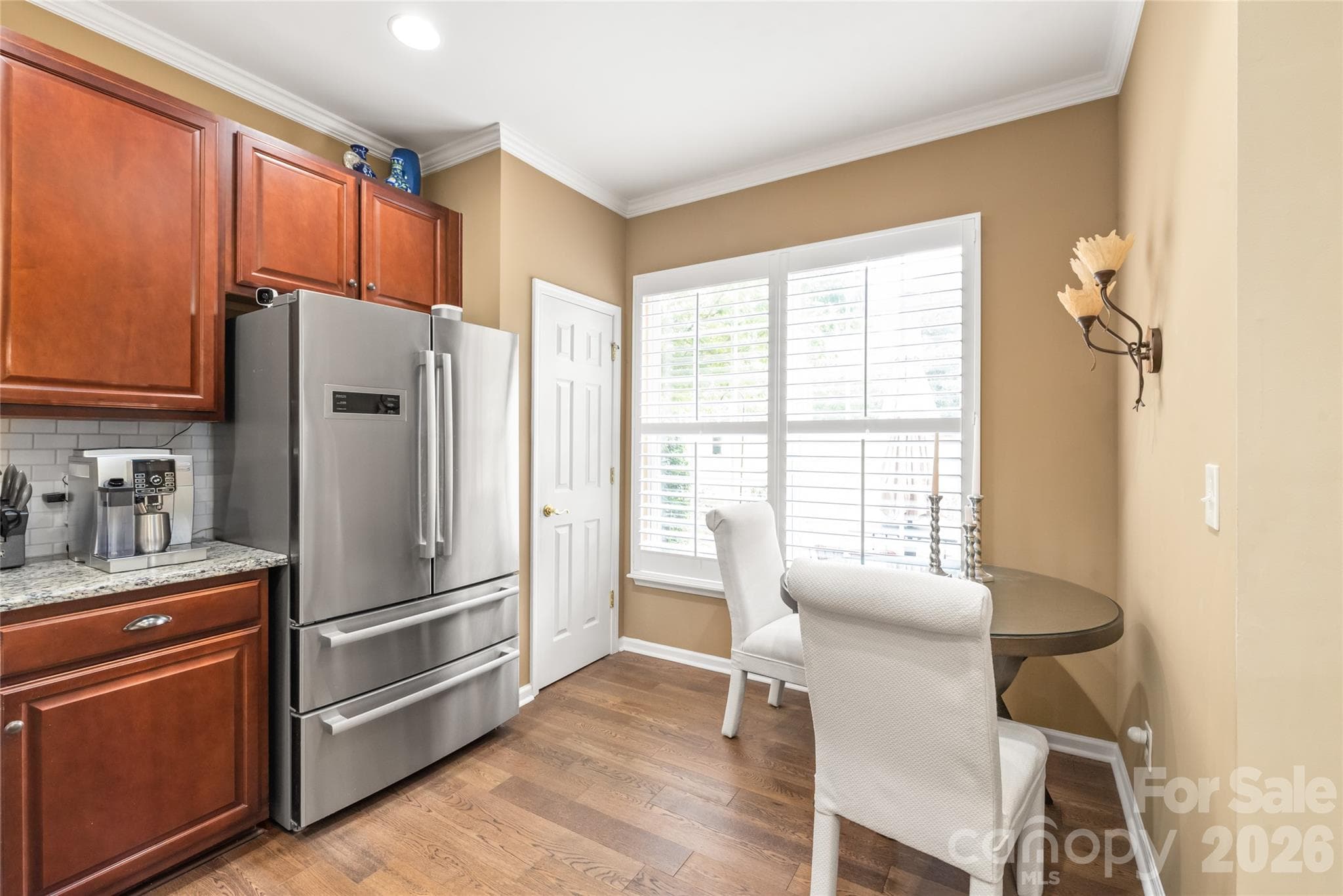 Newly installed  custom plantation shutters grace ALL the windows. (2026) - 4780 Grier Farm Lane, Charlotte