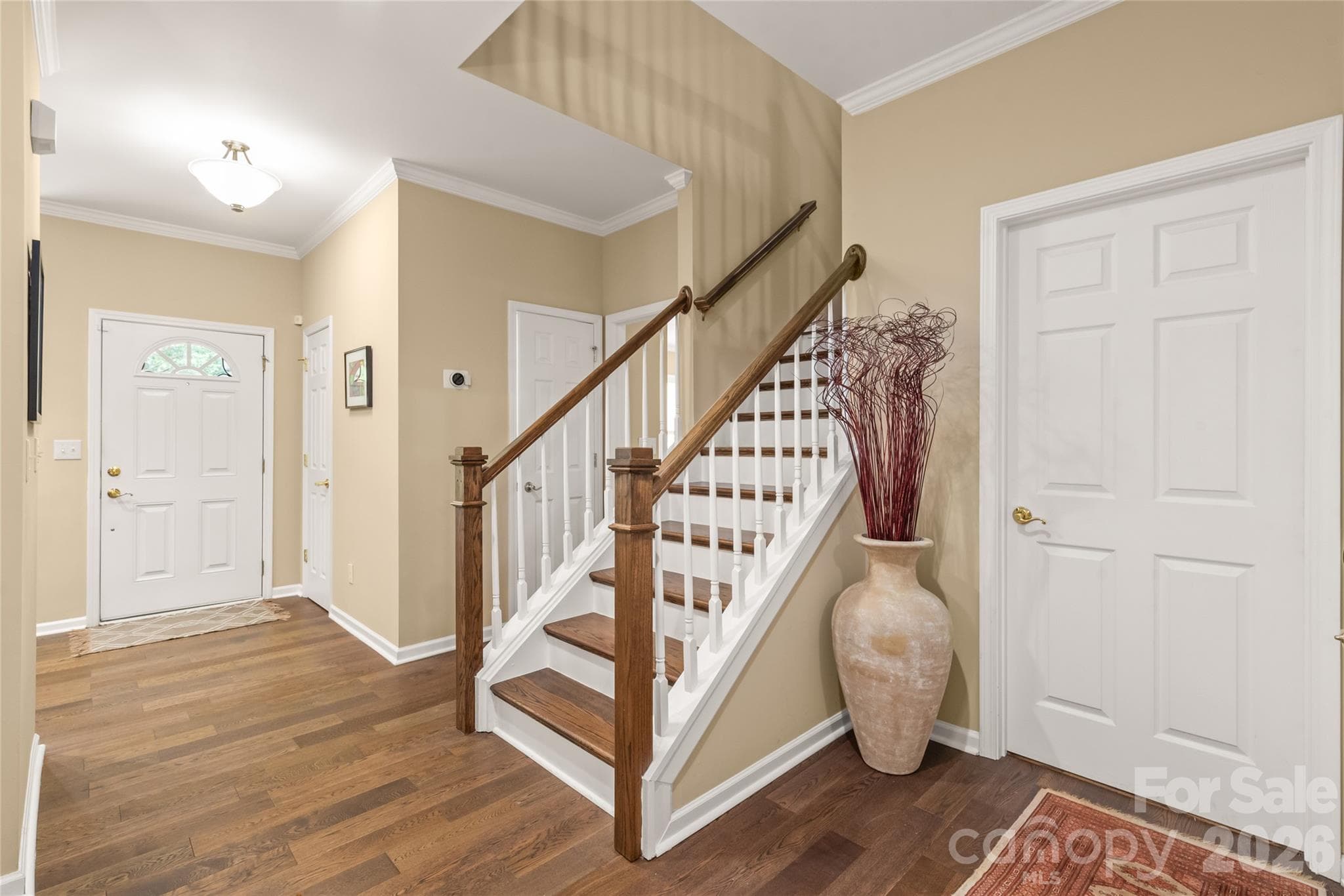 Head upstairs to find two spacious additional bedrooms, a versatile open loft, and convenient walk-in attic space for endless, easy-access storage. - 4780 Grier Farm Lane, Charlotte