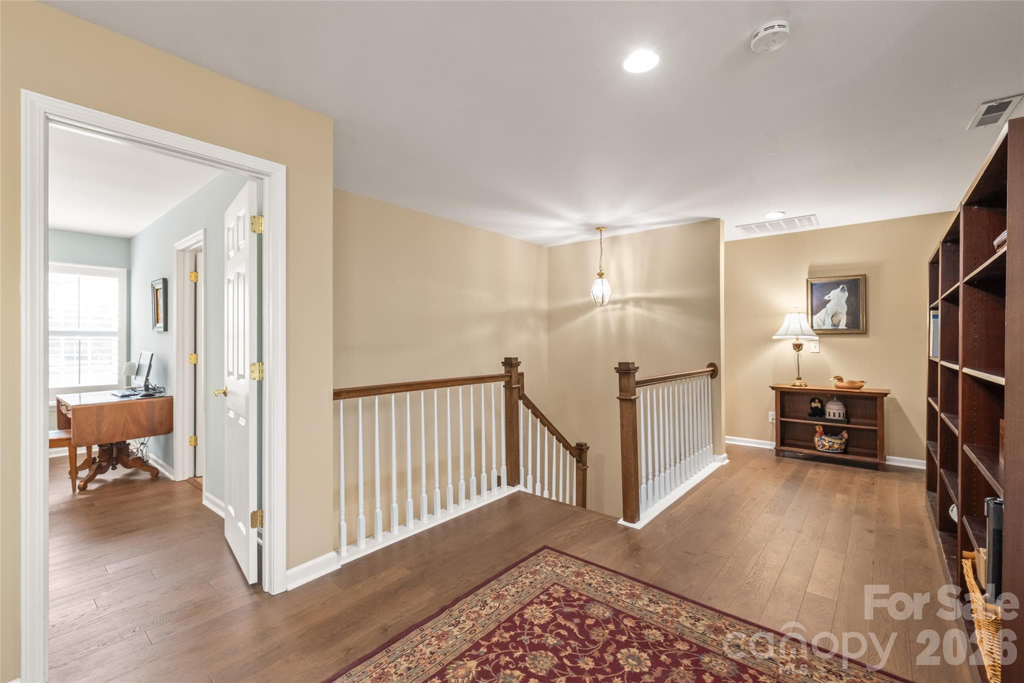 Abundant Storage: Custom garage shelving, attic fan, a spacious under-stairs nook in the primary suite (ideal for closet expansion), and two dedicated second-floor storage areas (one custom-enlarged for easy access). - 4780 Grier Farm Lane, Charlotte