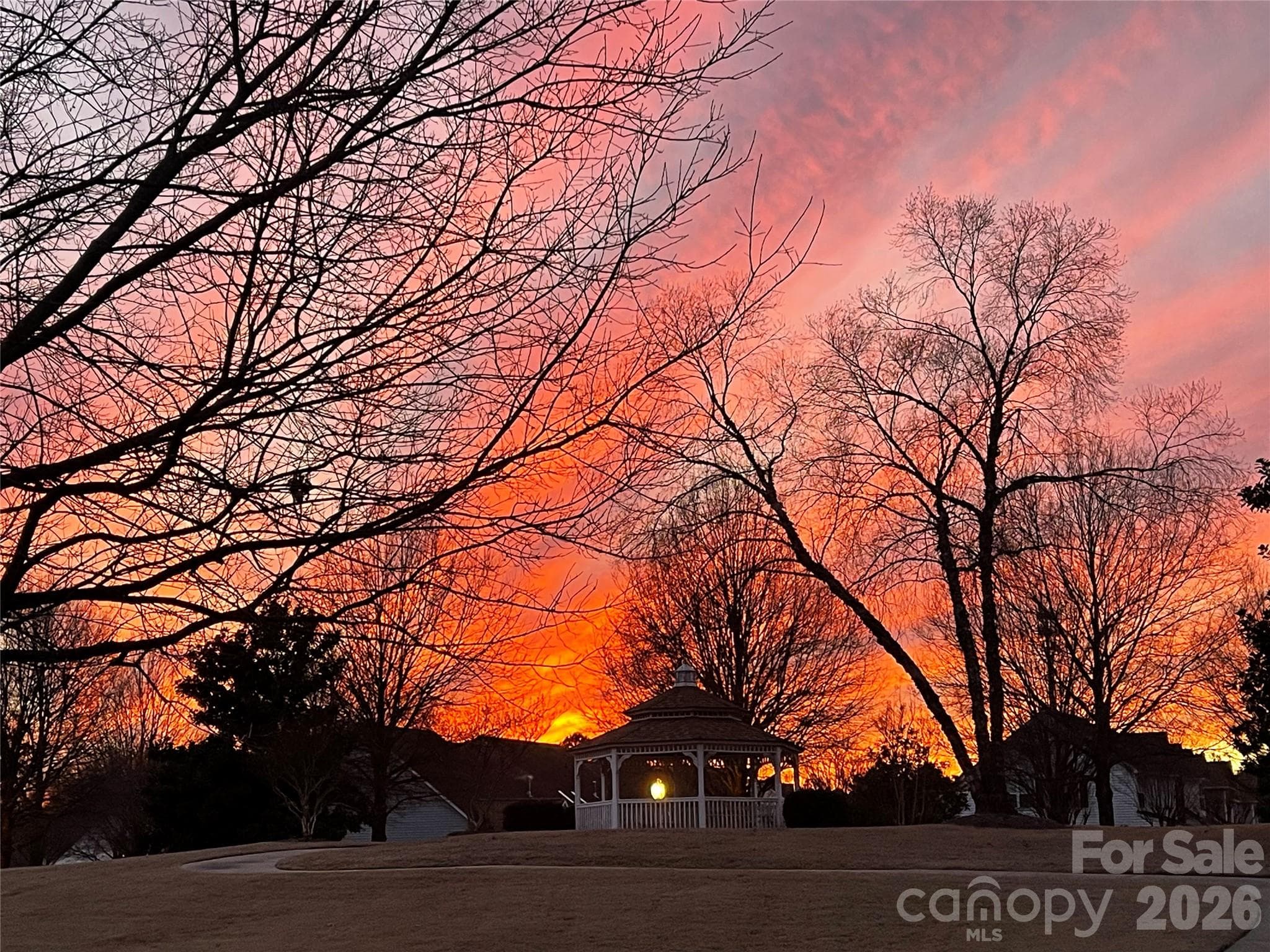 Unwind at the end of the day with front-row seats to breathtaking Carolina sunsets right from your front patio. - 4780 Grier Farm Lane, Charlotte