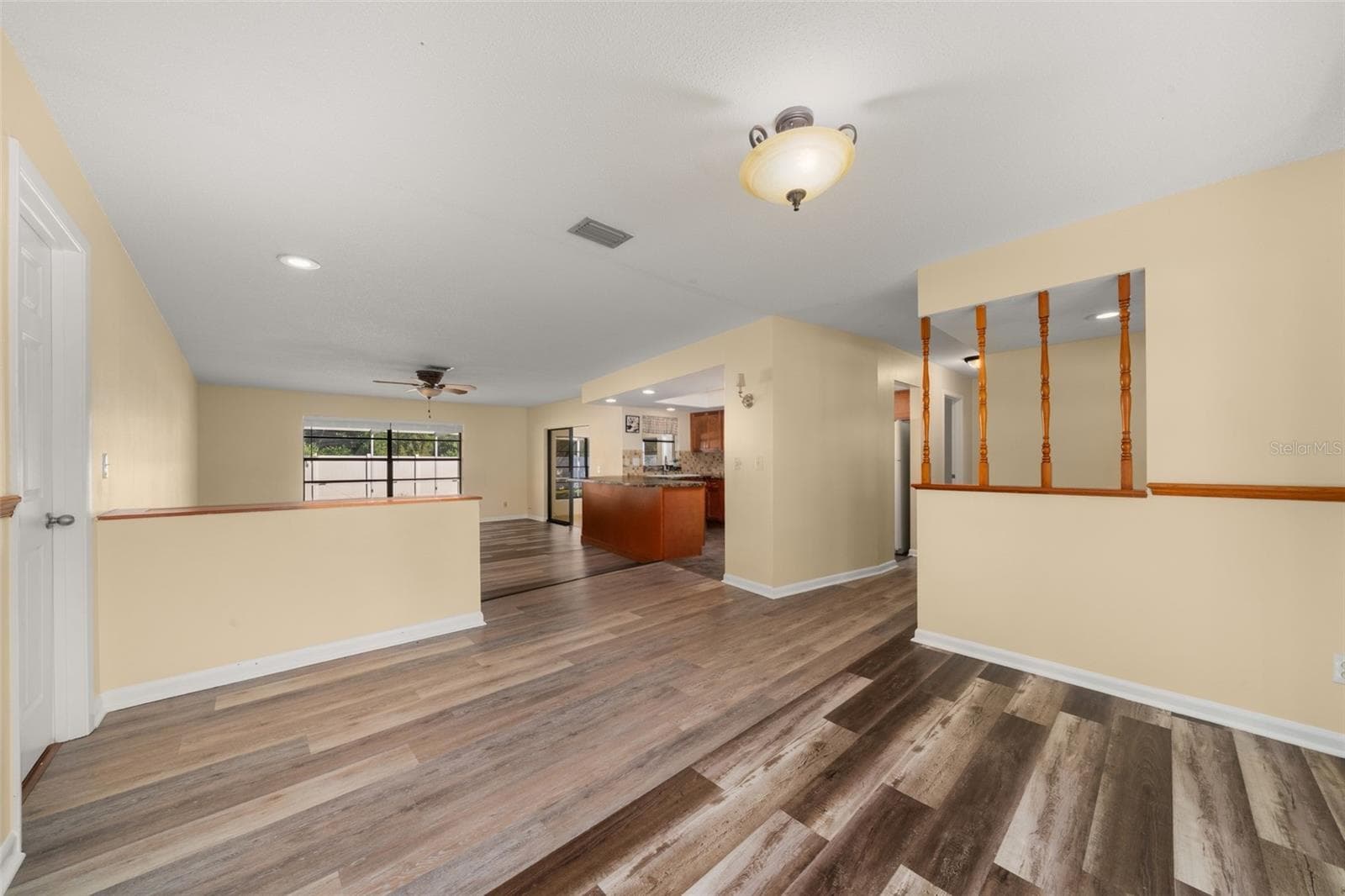 View from dining room to living room - 302 LOTUS AVE, SEBRING