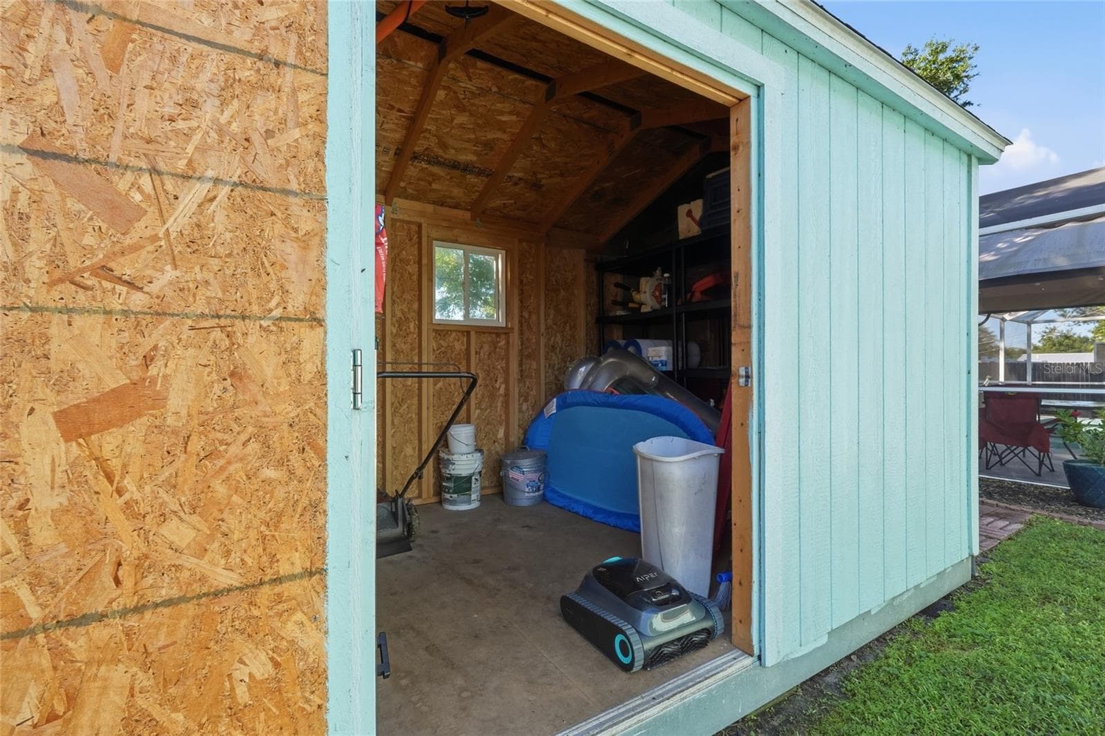 Large storage shed in case the garage isn't big enough for your needs. - 630 DARWIN RD, VENICE