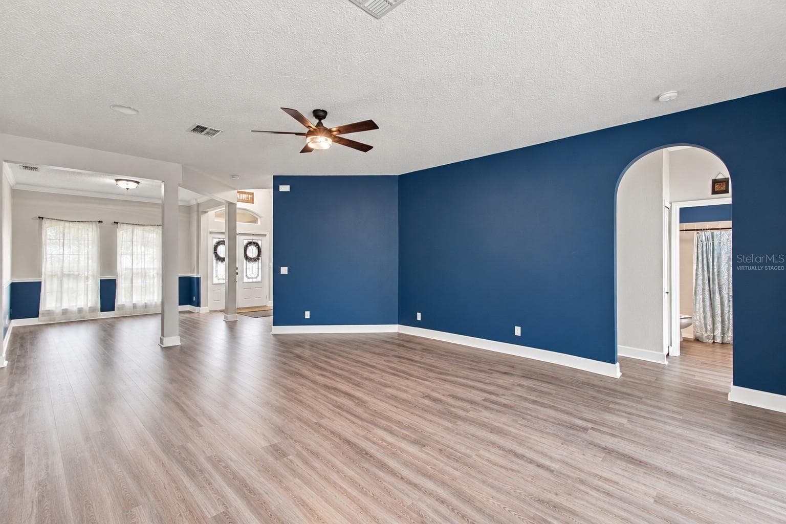 family room virtually staged - 14031 ZEPHERMOOR LN, WINTER GARDEN