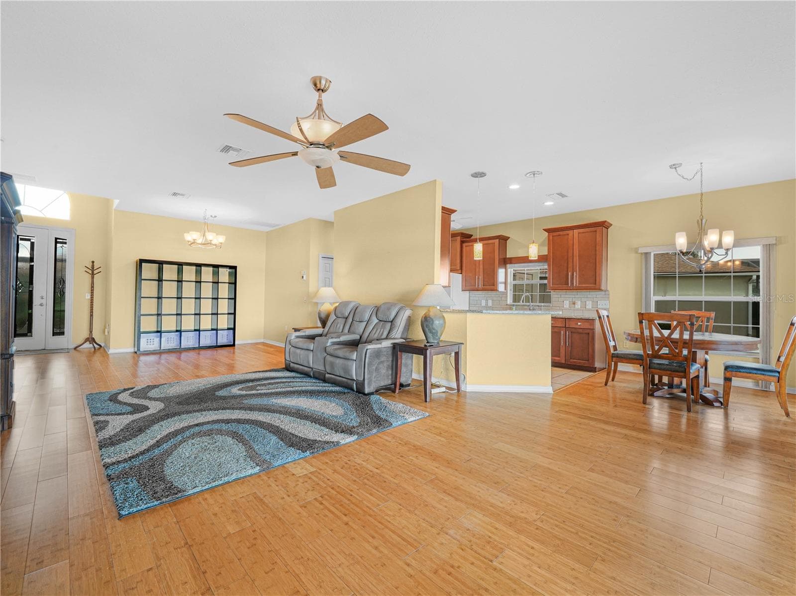 Living Room with Bamboo Flooring - 5385 HOGAN LN, WINTER HAVEN