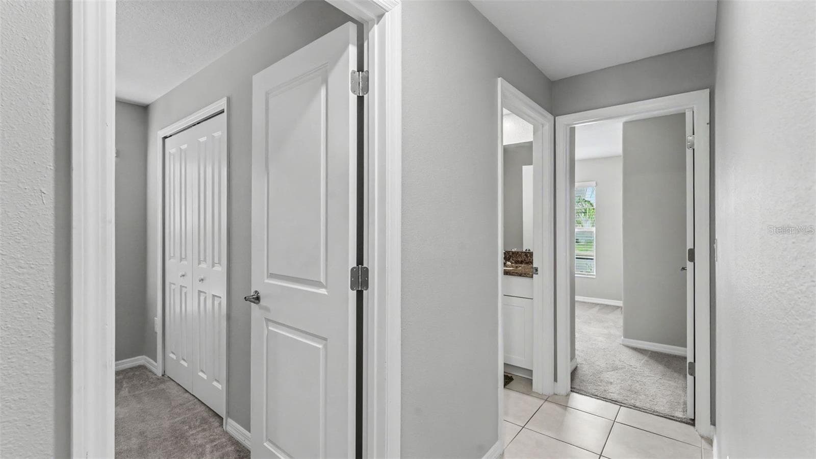 HALLWAY TO THREE BEDROOMS - SPLIT PLAN - 2790 RED EGRET DR, BARTOW