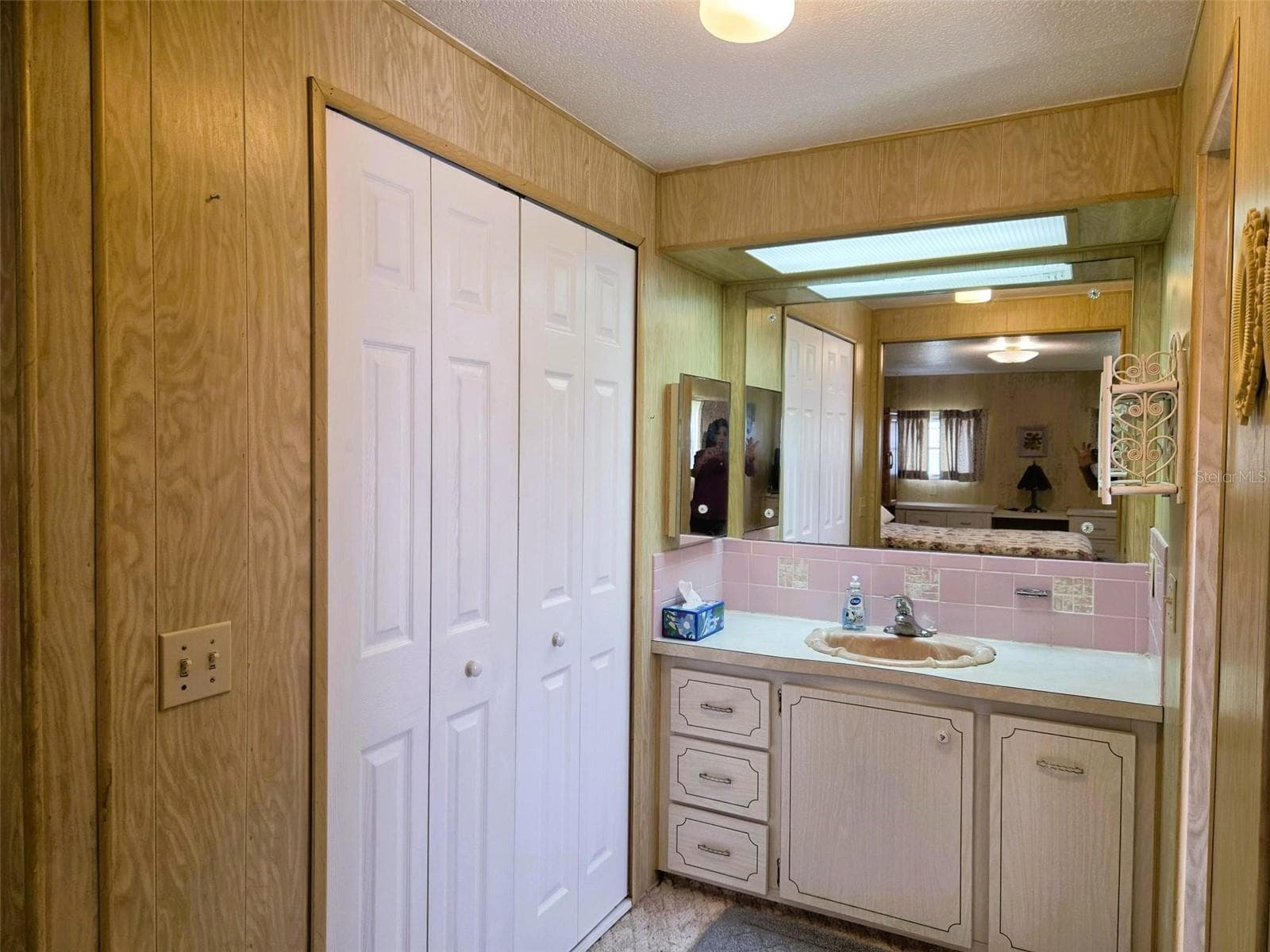 Another View of Primary Bath Vanity area and walk in closet view - 3308 OVER CUP OAK TER, SARASOTA