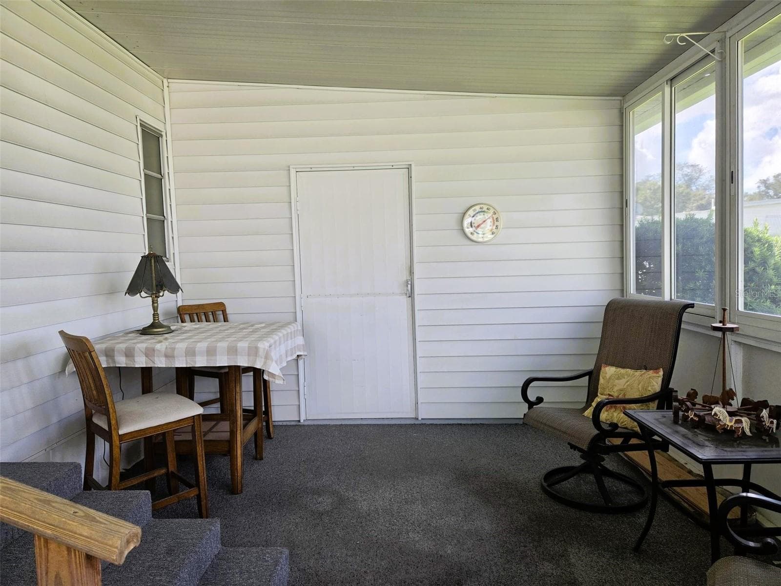 Nice size screened and covered Lanai area door leads to shed where washer and dryer are located. - 3308 OVER CUP OAK TER, SARASOTA