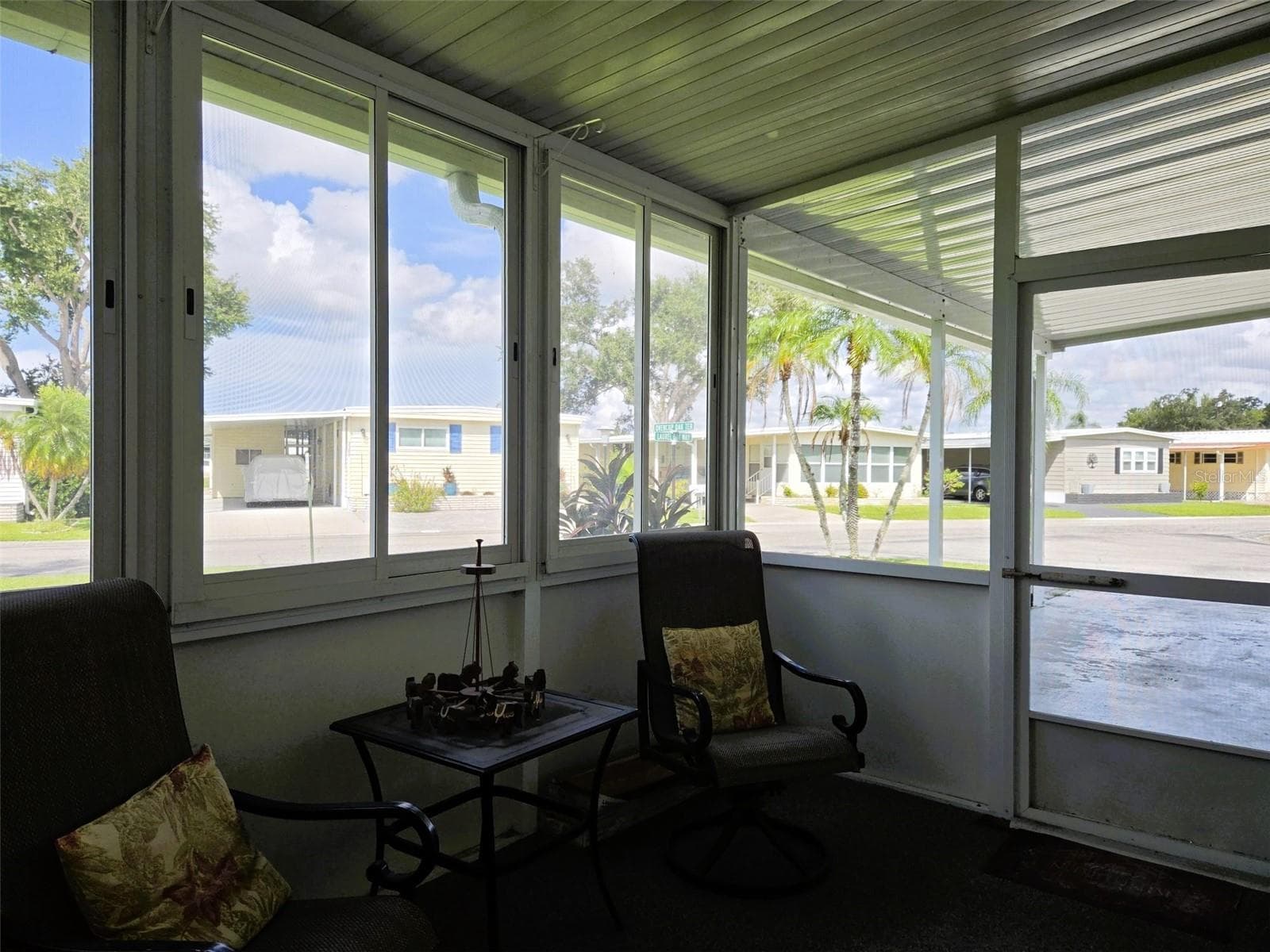 Lanai is screened and also has windows to keep rain out - 3308 OVER CUP OAK TER, SARASOTA