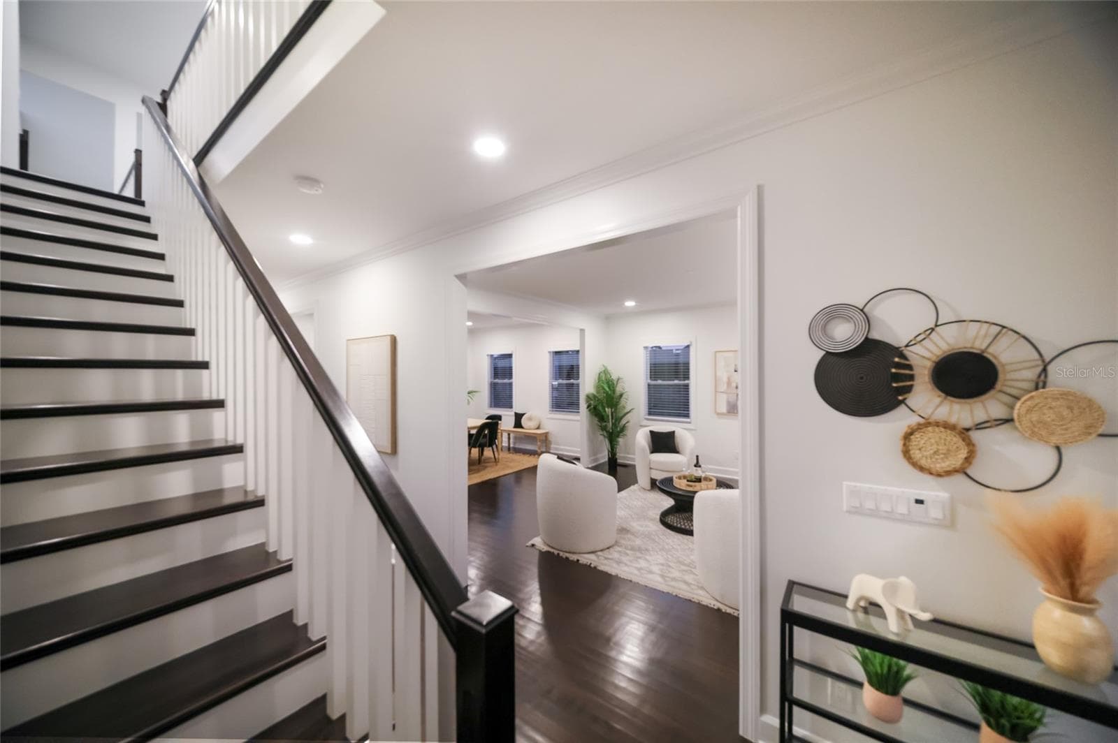 Front stair case leads to additional bedrooms, bathroom, loft and 2nd story deck. - 5060 18TH AVE W, BRADENTON
