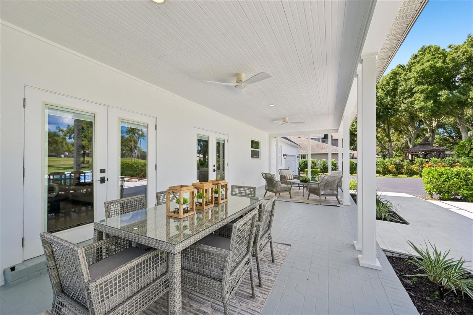 Expansive back porch offers plenty of room to entertain. - 5060 18TH AVE W, BRADENTON